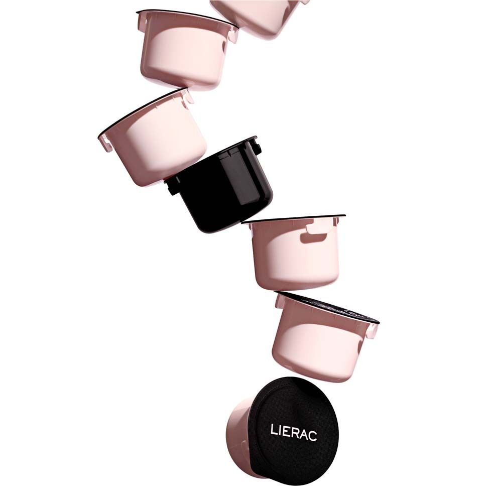 Diverse ricariche rosa e un coperchio nero. Alcune con coperchio, altre senza.