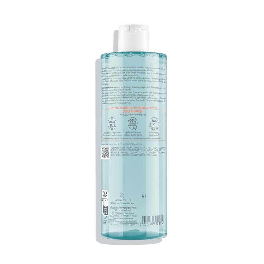 Liquido limpido in flacone trasparente con tappo bianco. Retro con testo e icone.