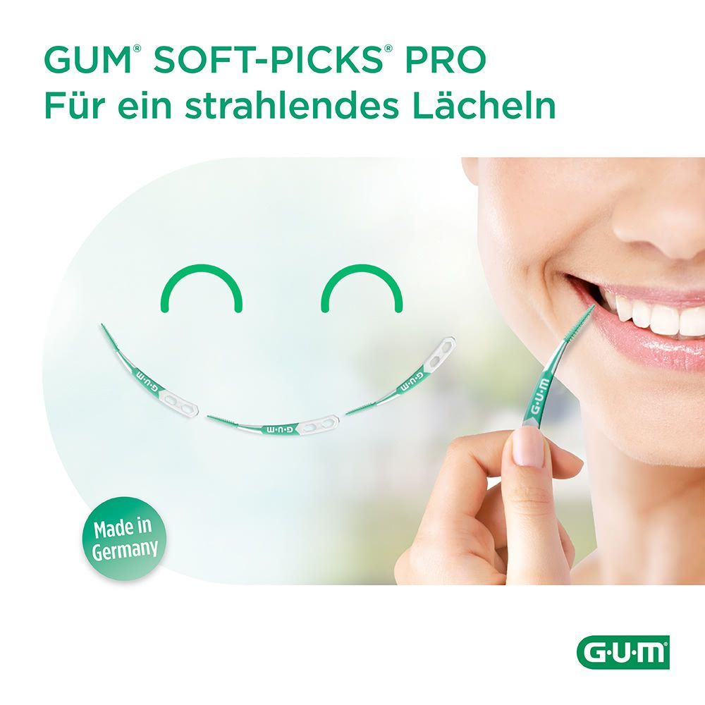 Donna sorridente usa G.U.M Soft-Picks Pro. Testo: Per un sorriso splendente. Made in Germany.