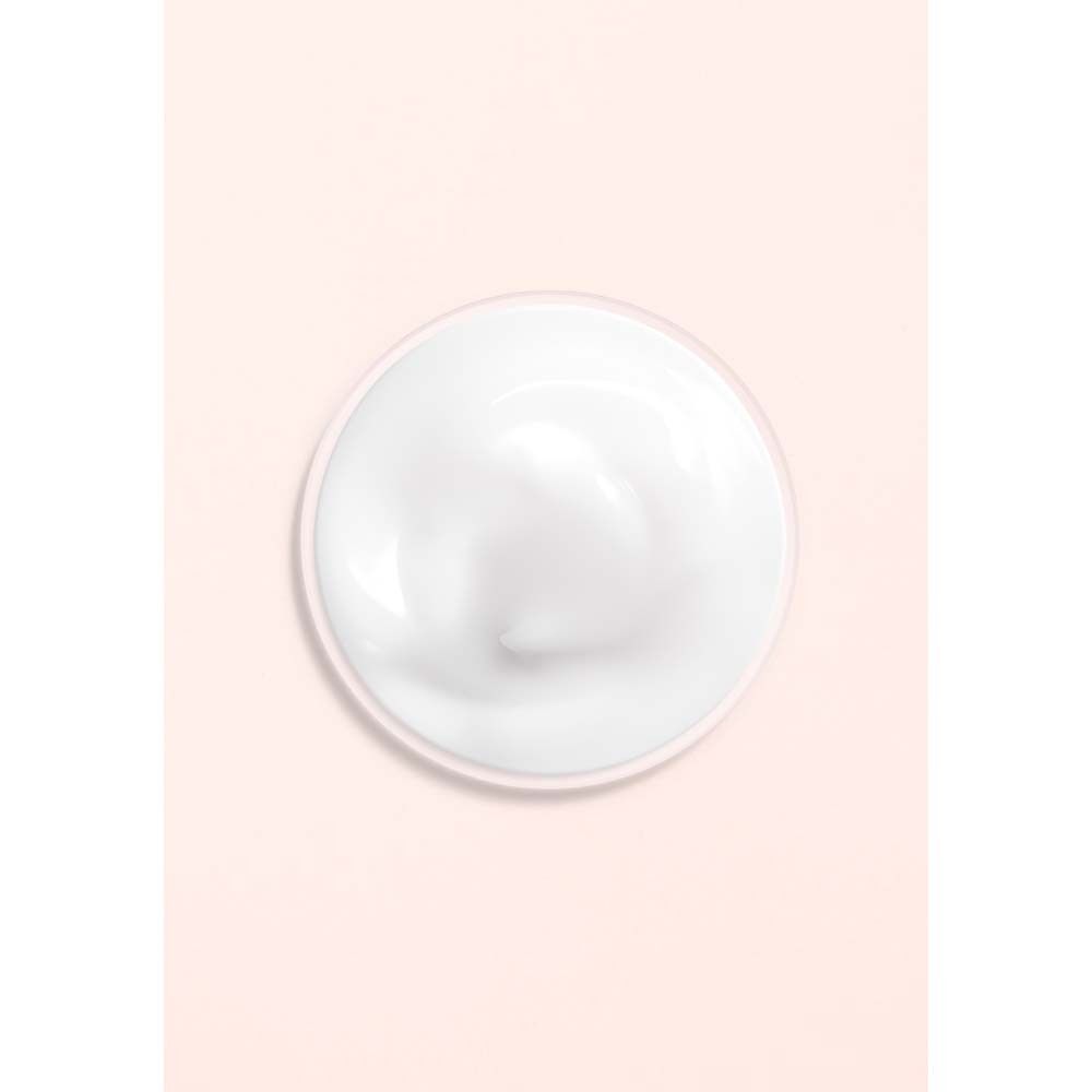 Prodotto in crema bianco su sfondo rosa. Forma rotonda.