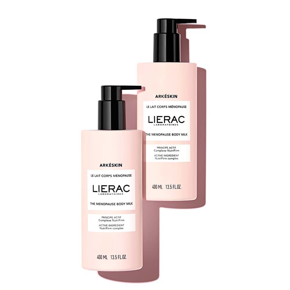 Due flaconi rosa con dosatori neri. Scritte: Arkéskin, LIERAC, The Menopause Body Milk.
