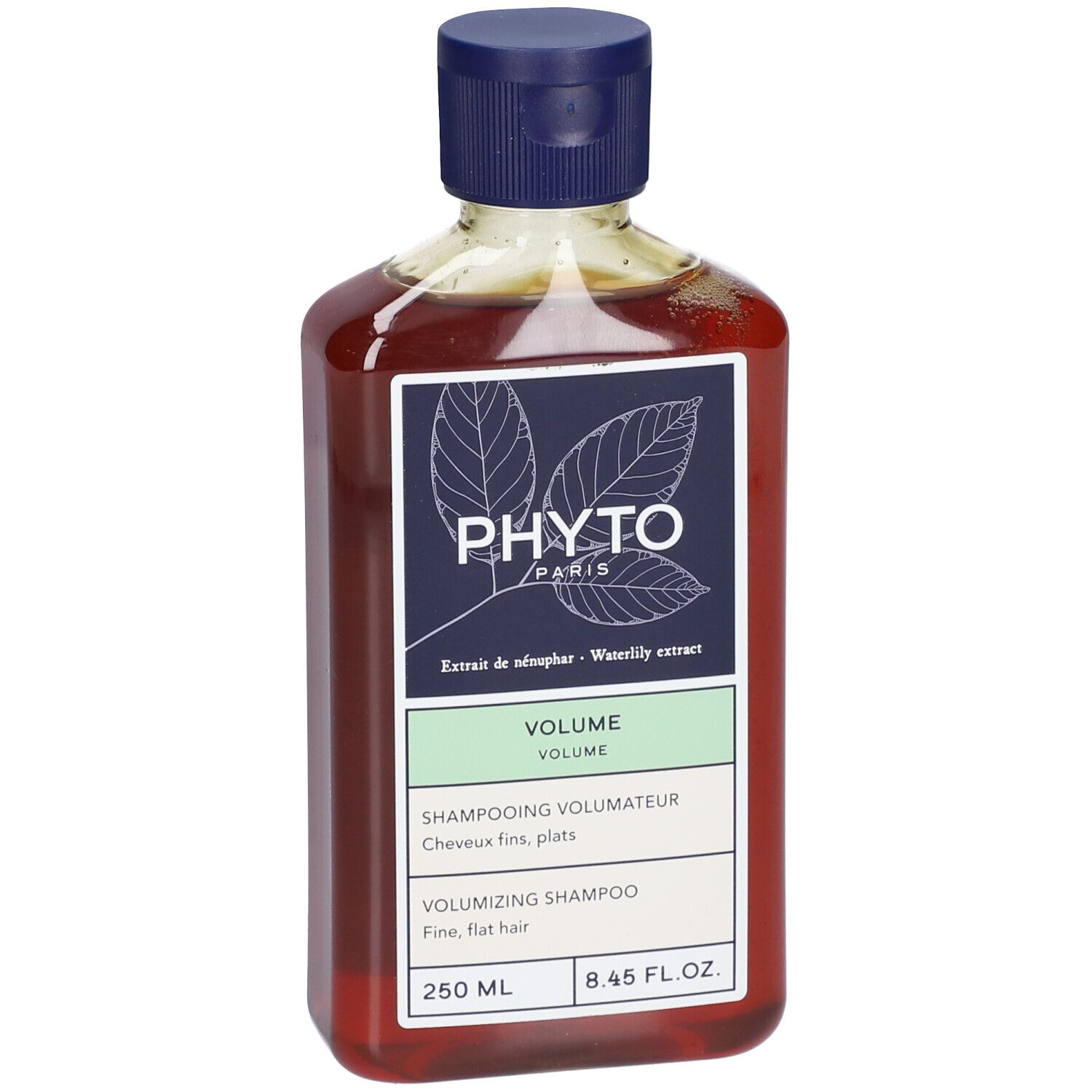 Flacone di shampoo marrone con tappo blu. Etichetta "PHYTO PARIS" e "VOLUME".