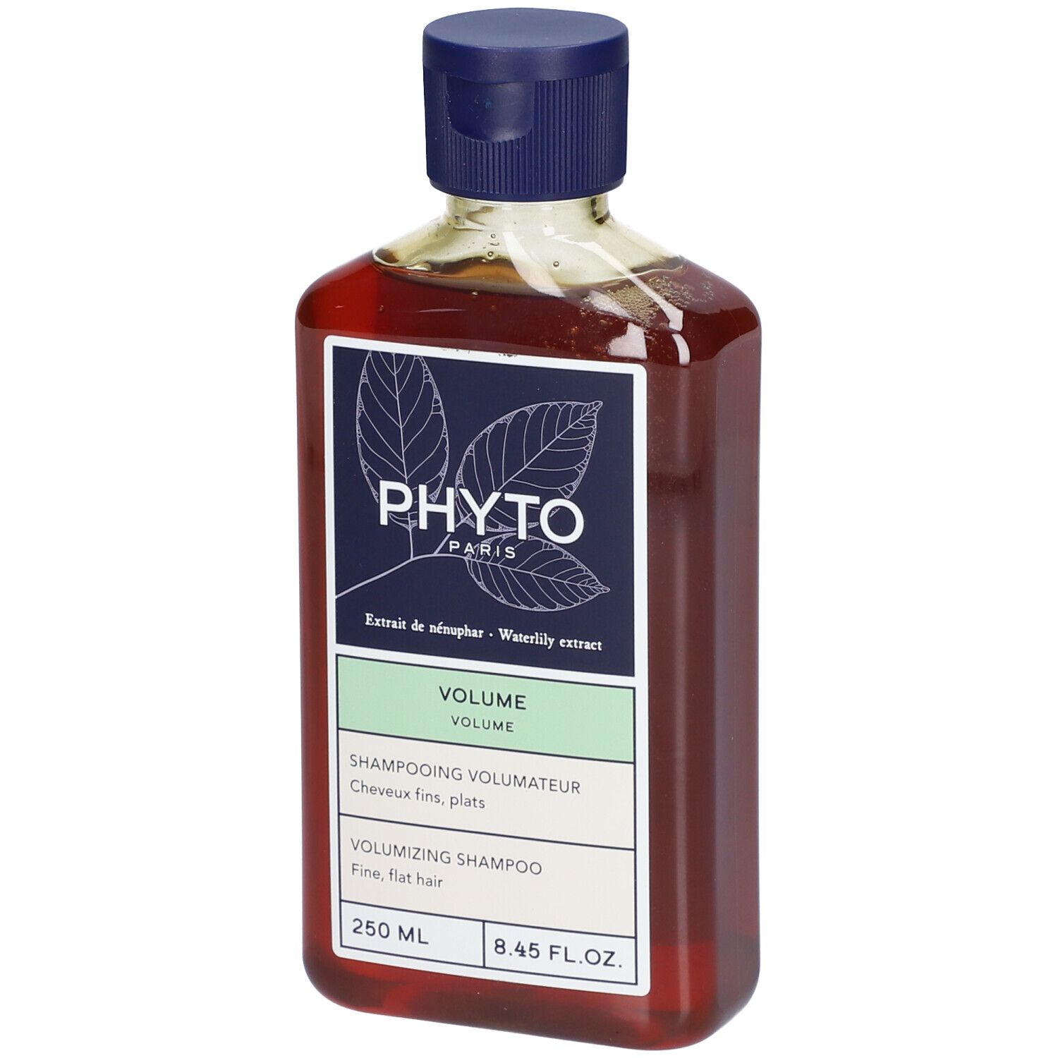 Flacone di shampoo marrone con tappo blu. Etichetta "PHYTO PARIS" e "VOLUME".