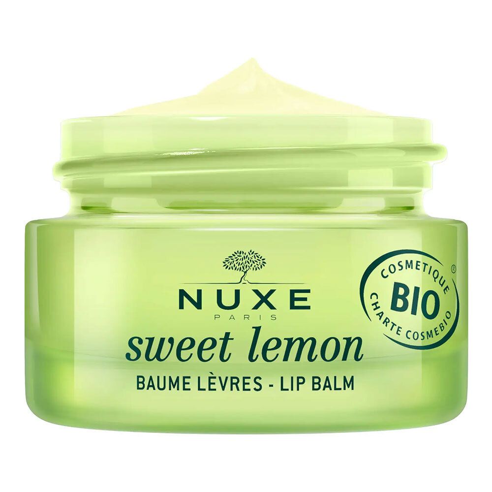 Vasetto di balsamo labbra aperto con coperchio. Scritta: NUXE, sweet lemon, Baume Lèvres - Lip Balm. Certificazione bio.
