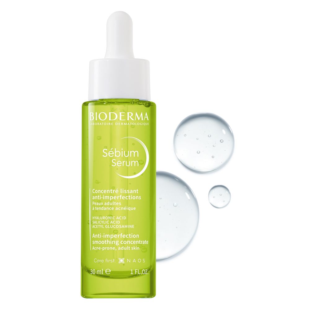 Flacone di siero verde con tappo e pipetta aperti. Scritta: BIODERMA Sébium Serum. 30 ml.