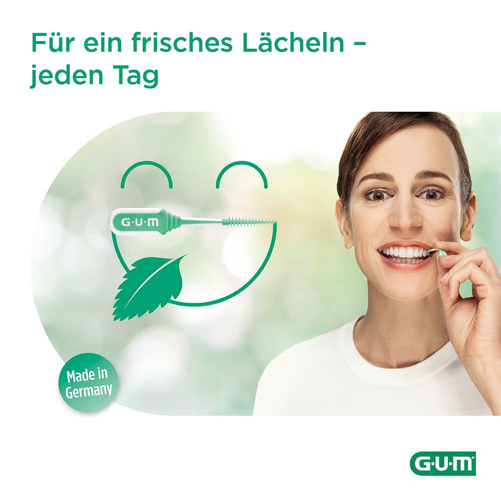 Una donna sorride e usa GUM Soft-Picks. Un logo verde e un sorriso stilizzato con una foglia di menta.