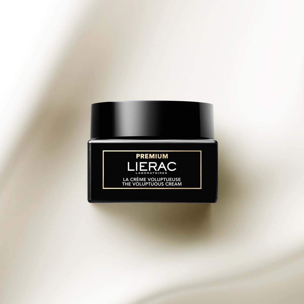 Vasetto nero con coperchio. Scritta: PREMIUM LIERAC. Testo: LA CRÈME VOLUPTUEUSE.