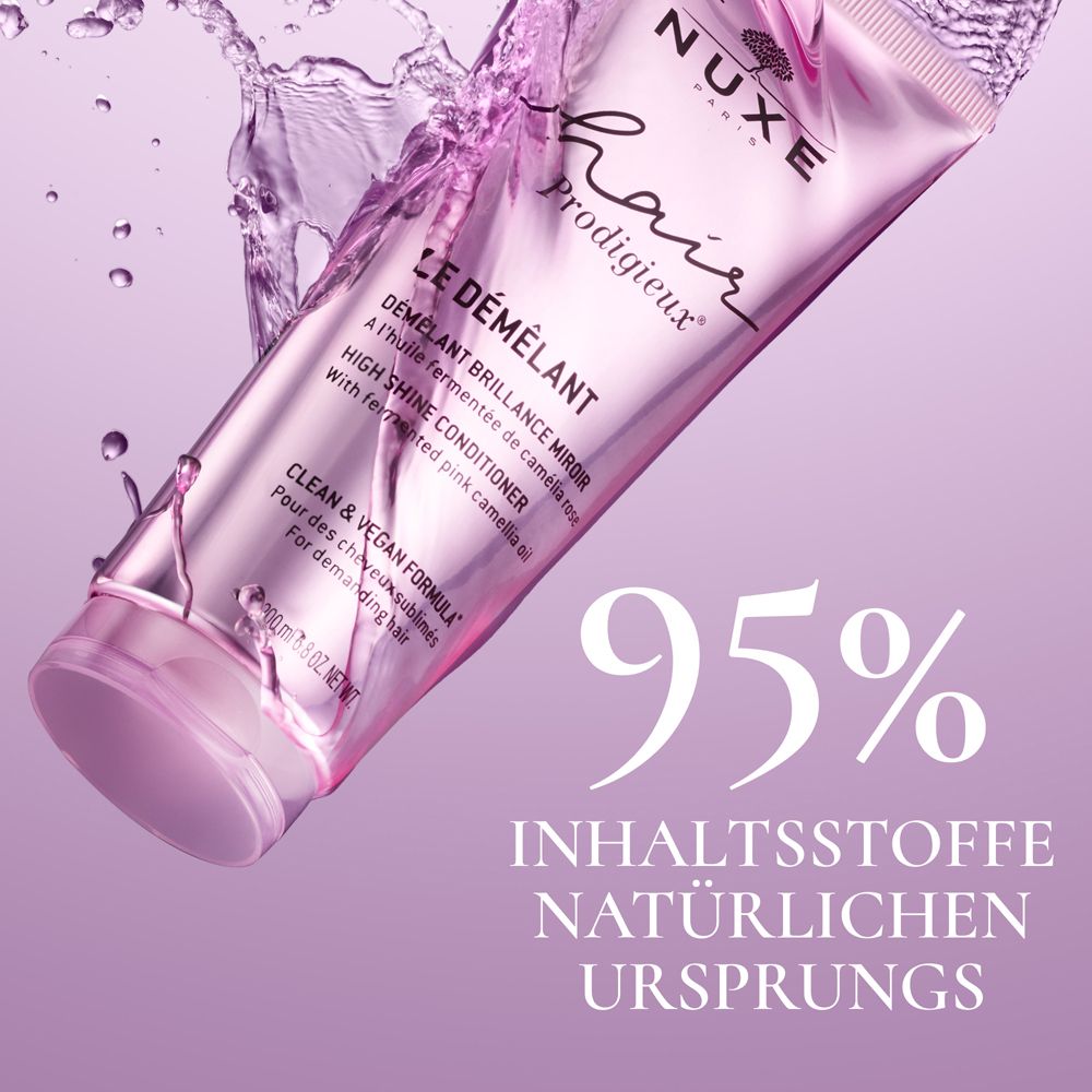 Tubo rosa NUXE Hair Prodigieux con testo: 95% ingredienti di origine naturale.