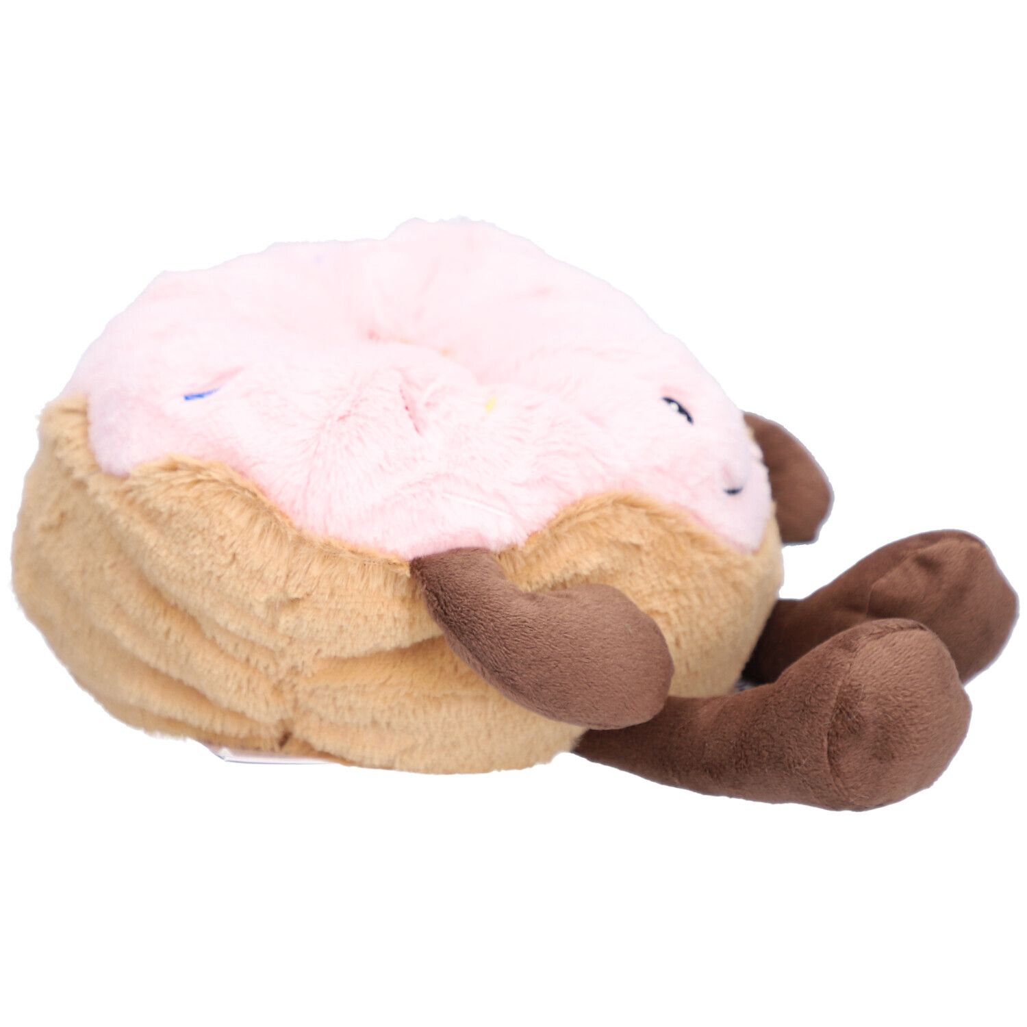 Peluche a forma di ciambella con glassa rosa e braccia e gambe marroni.