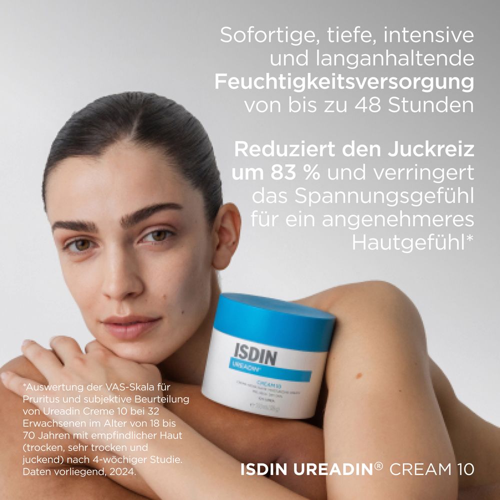 Donna che tiene un vaso di crema con coperchio blu. Scritta: ISDIN UREADIN CREAM 10. Testo: Idratazione fino a 48 ore.