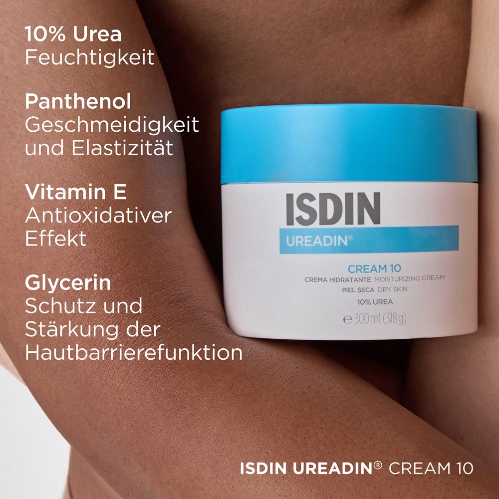 Vaso di crema con coperchio blu. Scritta: ISDIN UREADIN CREAM 10. Testo: 10% Urea, Pantenolo, Vitamina E, Glicerina.