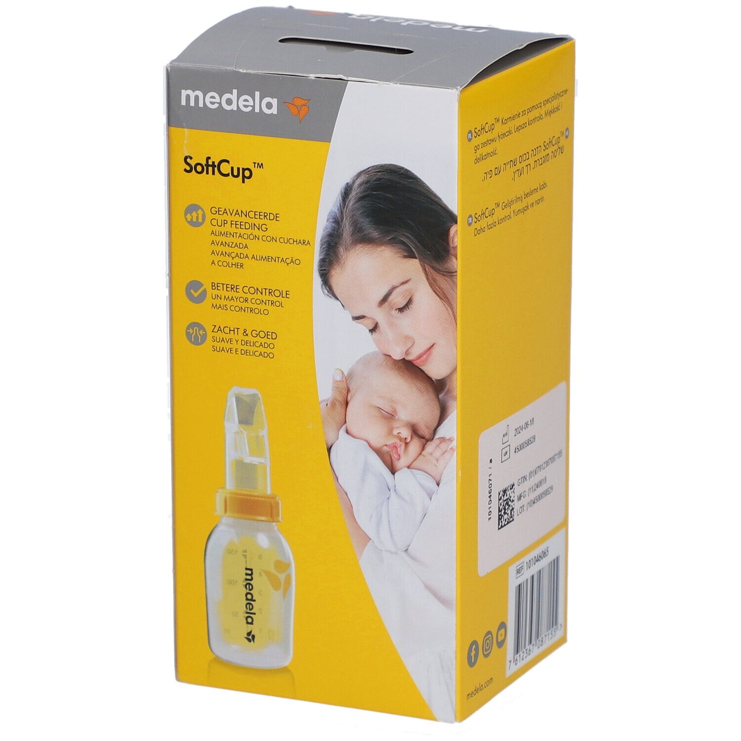 Confezione Medela SoftCup, tazza speciale. Immagine del prodotto e testo. Giallo e grigio.
