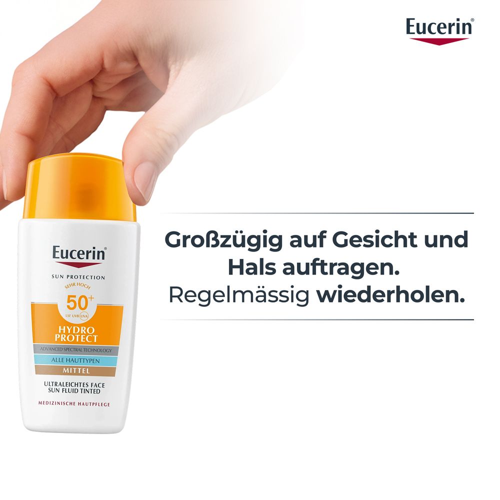 Mano che tiene un flacone di fluido colorato. Testo: Applicare generosamente su viso e collo. Ripetere.