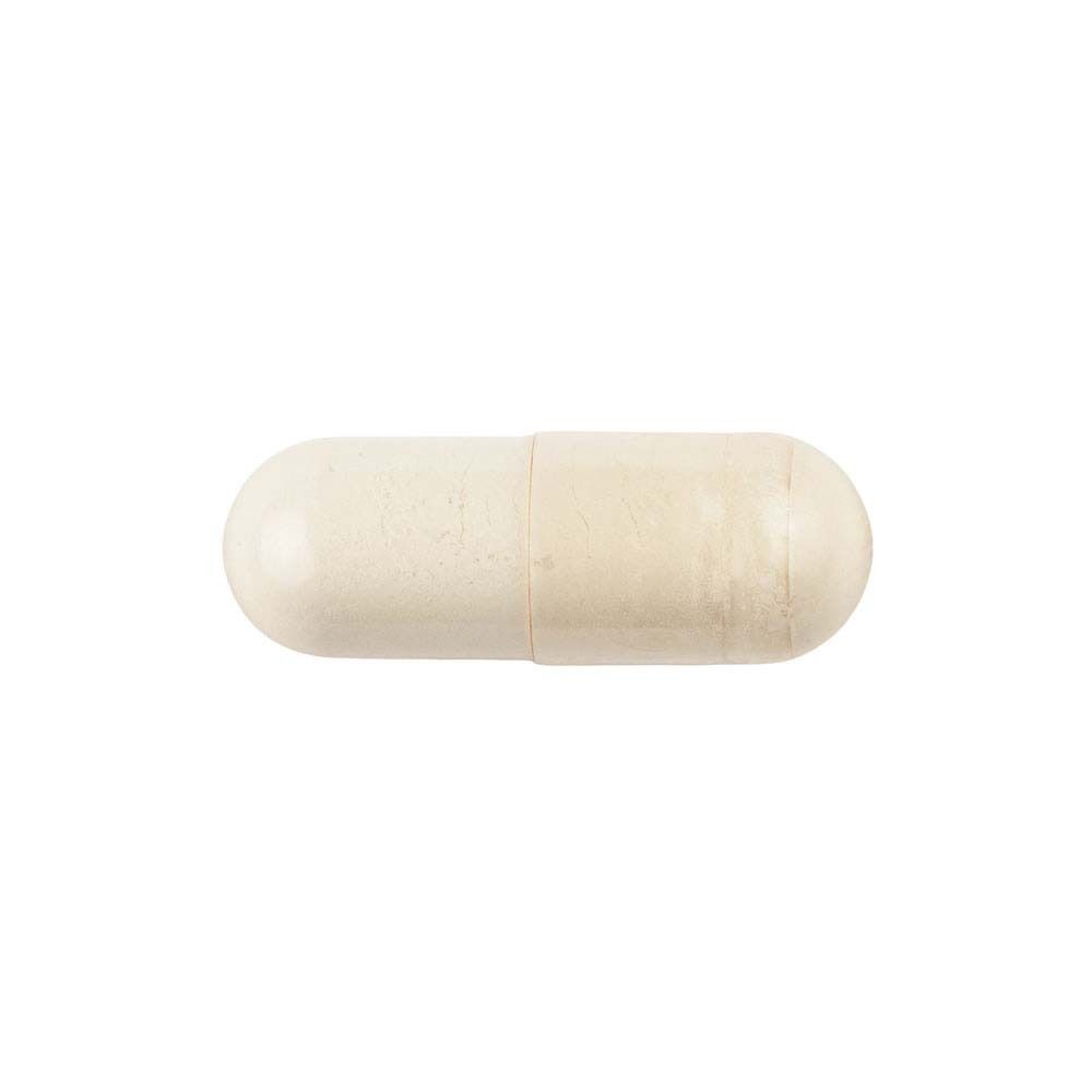 Una capsula allungata, color crema.