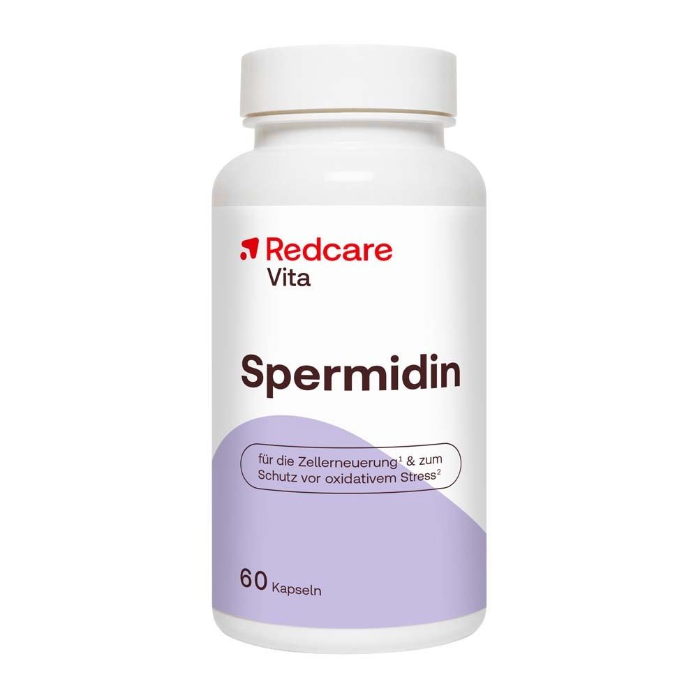 Flacone bianco Redcare Vita Spermidin. Scritto: 60 capsule. Contiene estratto di germe di grano, zinco e vitamina B1. Sfondo viola.
