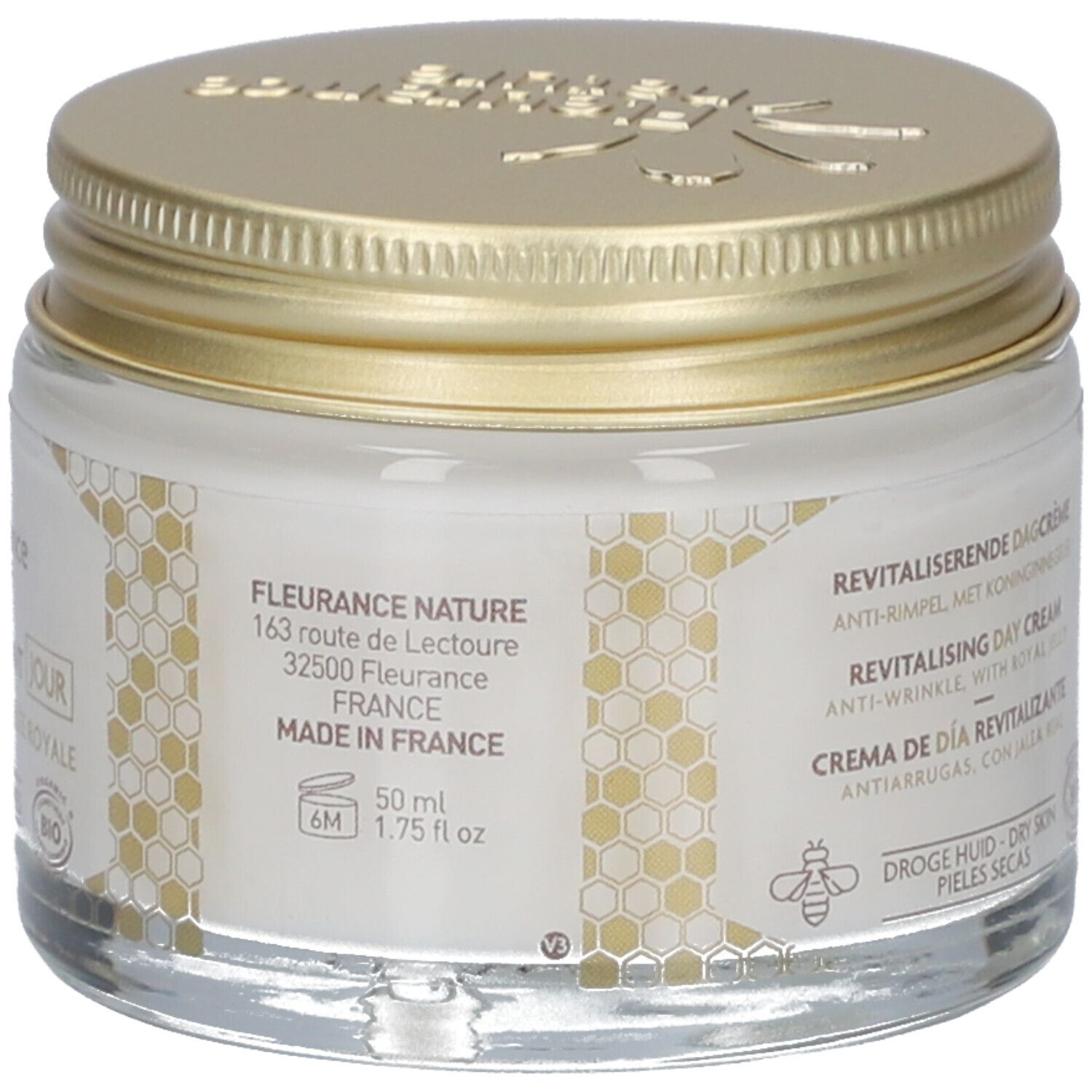 Vasetto con coperchio dorato. Scritta: Fleurance Nature, 50 ml, 1.75 fl oz. Indirizzo e origine. Certificazione Bio. Design a nido d'ape.