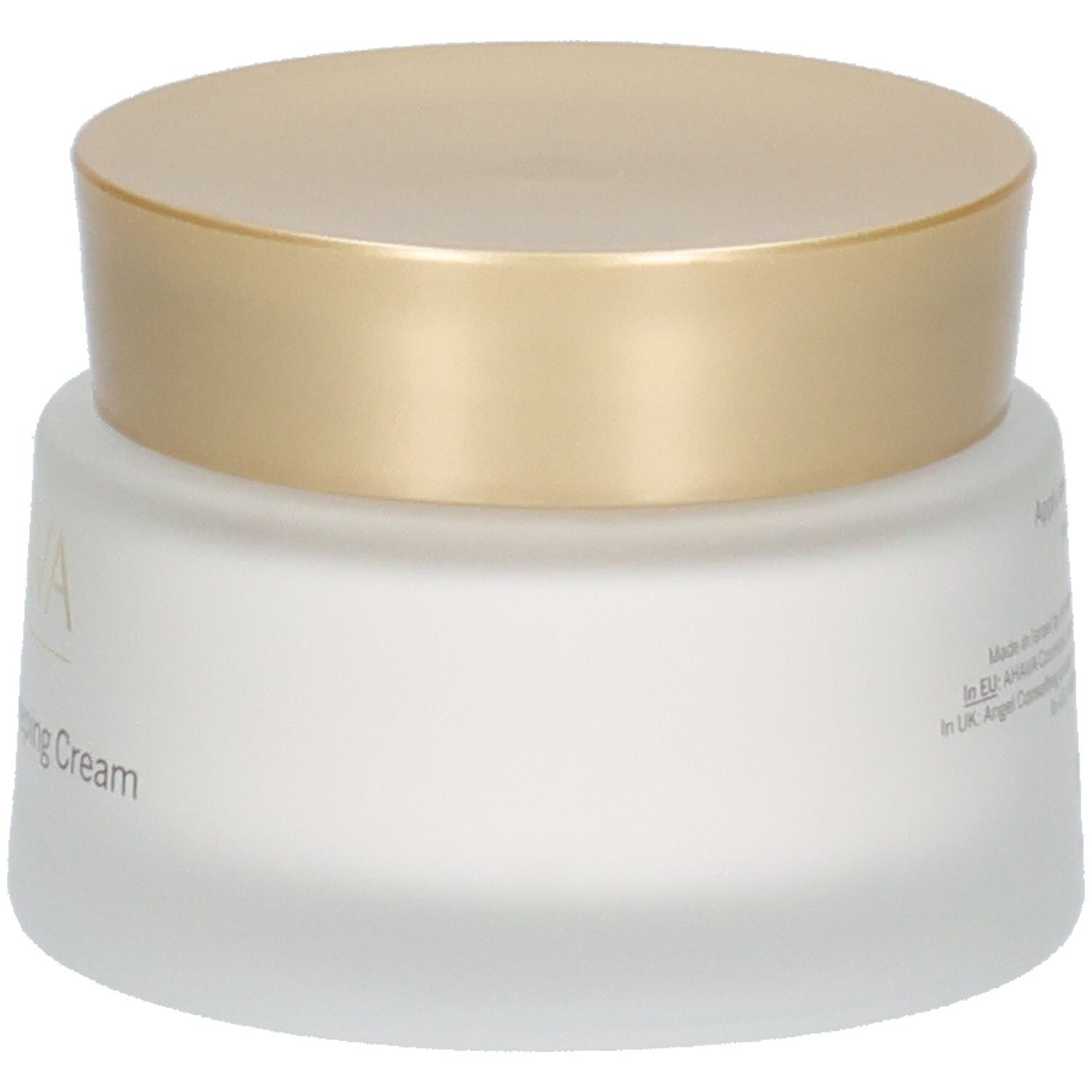 Vasetto di crema con coperchio dorato. Scritta AHAVA e Brightening Sleeping Cream. Vetro bianco smerigliato.