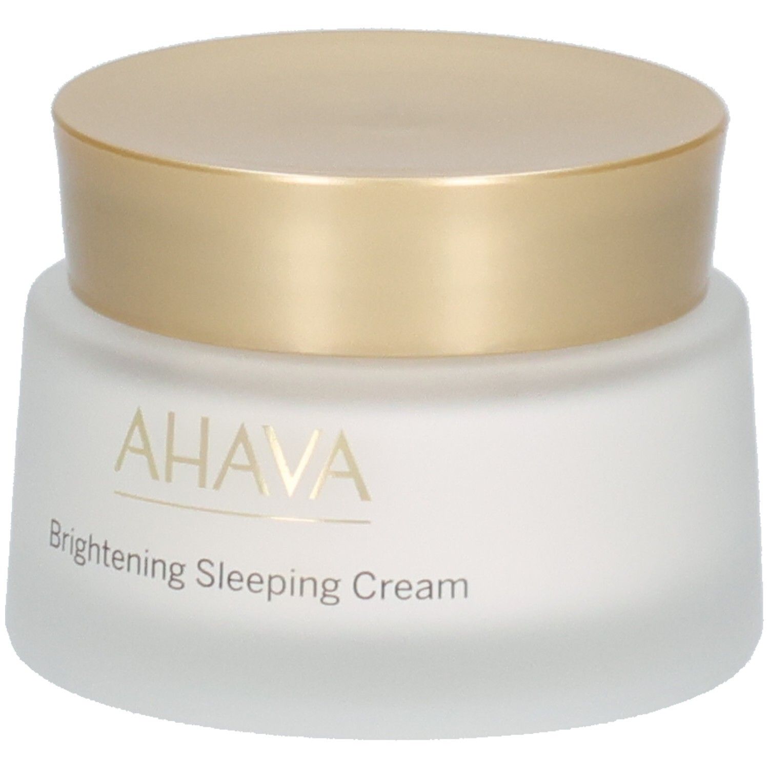 Vasetto di crema con coperchio dorato. Scritta AHAVA e Brightening Sleeping Cream. Vetro bianco smerigliato.