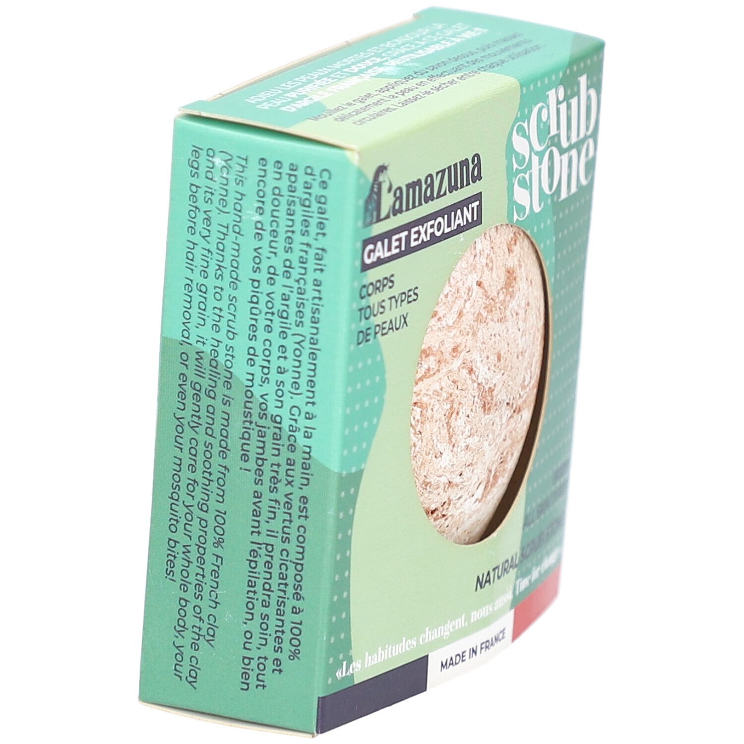 Scatola verde con pietra esfoliante. Scritta: Lamazuna, Galet Exfoliant, tutti i tipi di pelle. Fatto in argilla francese.
