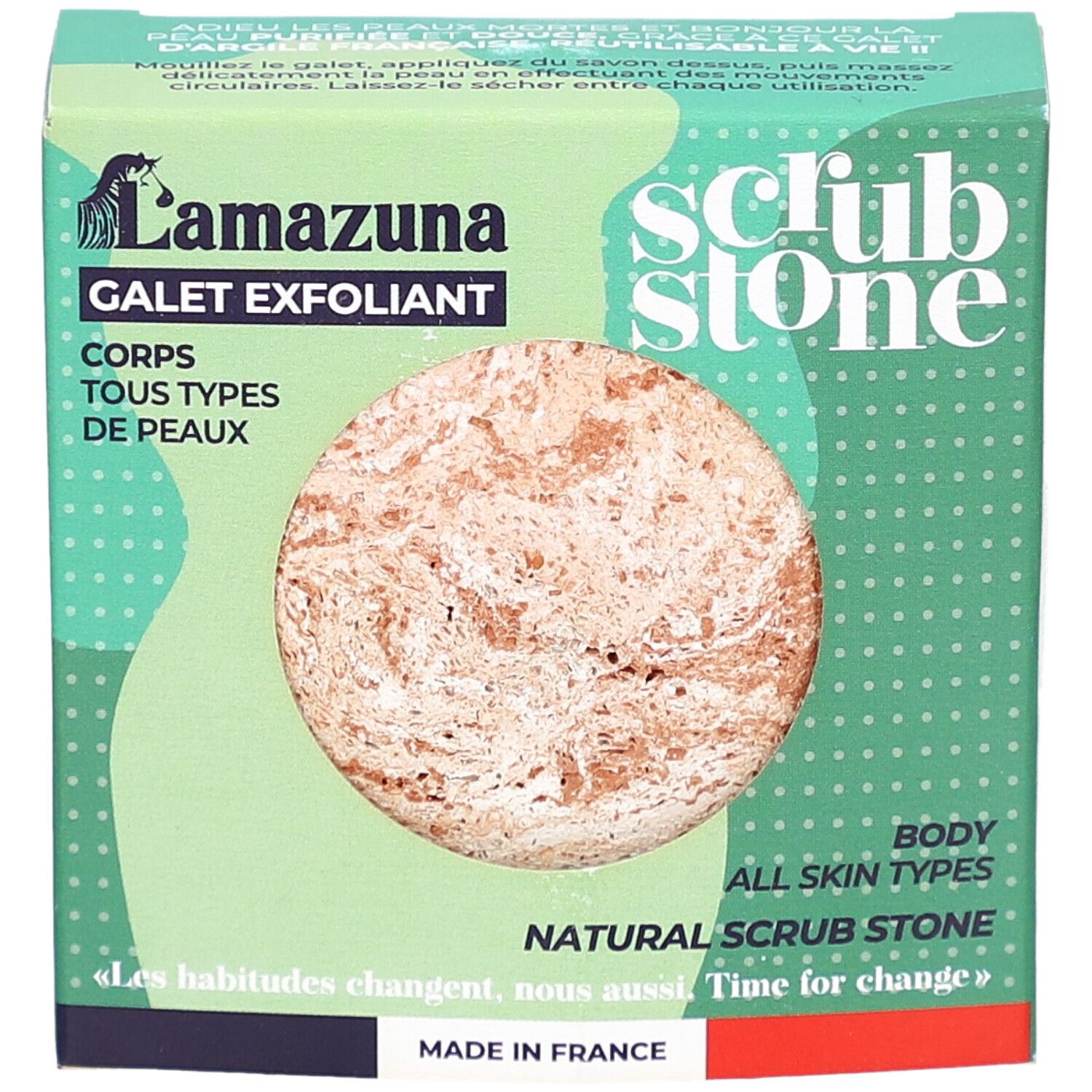 Scatola verde con pietra esfoliante rotonda. Scritta: Lamazuna, Galet Exfoliant, Scrub Stone, tutti i tipi di pelle. Fatto in Francia.