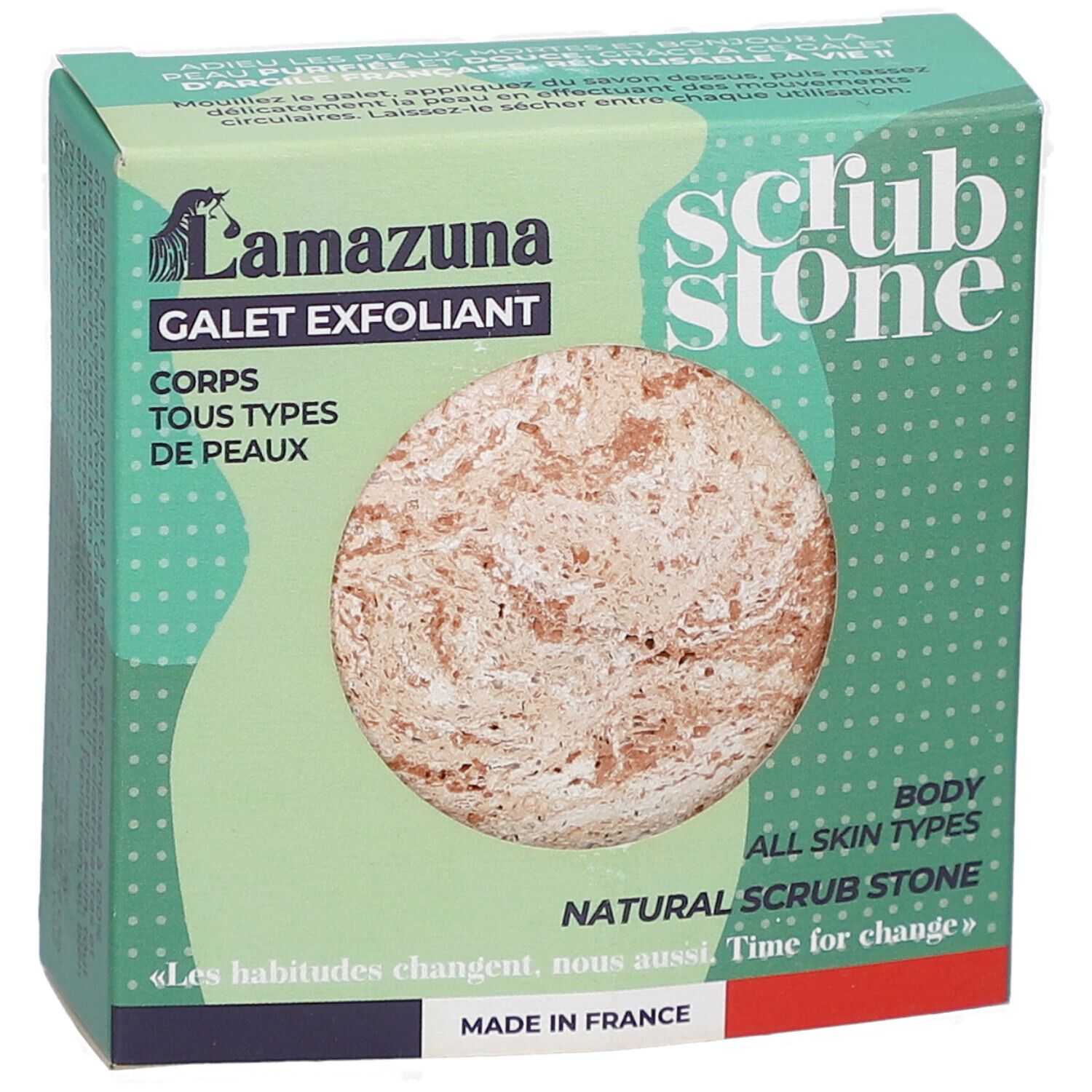 Scatola verde con pietra esfoliante rotonda. Scritta: Lamazuna, Galet Exfoliant, Scrub Stone, tutti i tipi di pelle. Fatto in Francia.