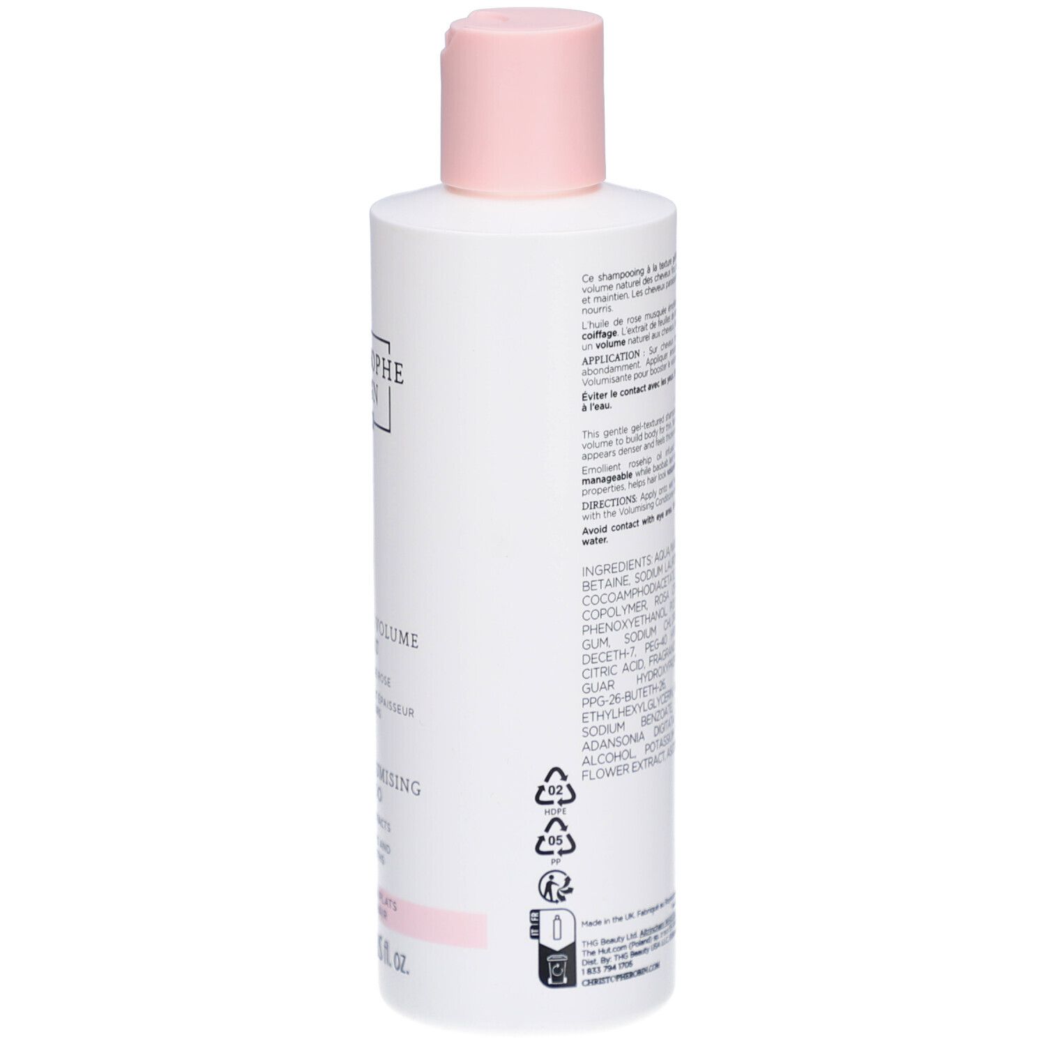 Retro di un flacone bianco con tappo rosa. Testo e ingredienti in più lingue. Pittogrammi e informazioni di produzione.