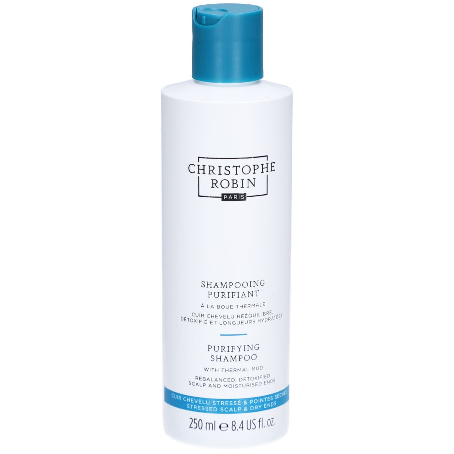 Flacone di shampoo bianco e blu. Scritta: Christophe Robin, Shampooing Purifiant, 250 ml.
