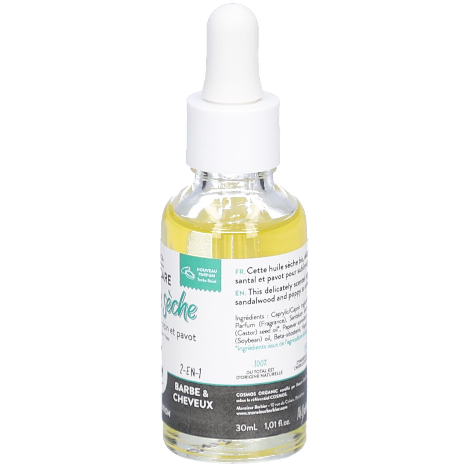 Bottiglia di vetro con olio giallo e pipetta. Etichetta con nome del prodotto, ingredienti e sigillo bio.