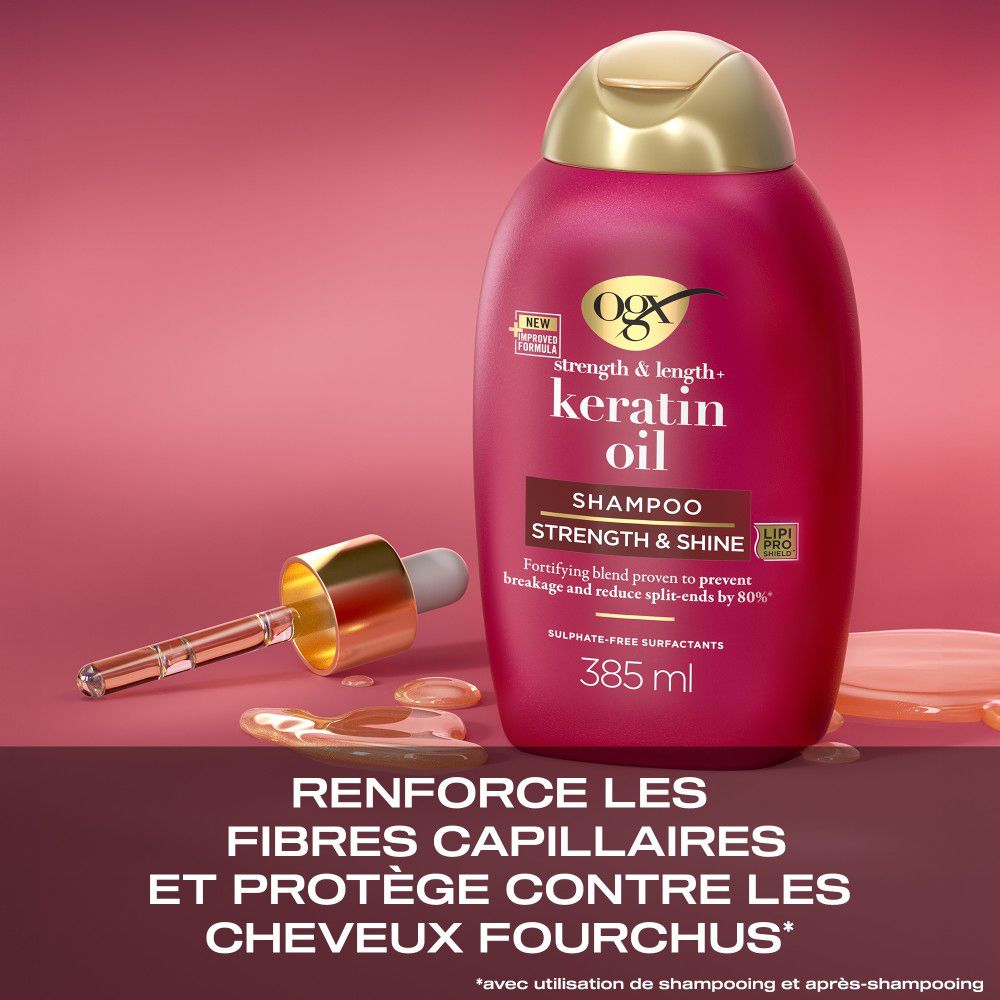 Flacone di shampoo rosso con tappo dorato. Testo: Keratin Oil, Shampoo, 385 ml. Con contagocce.