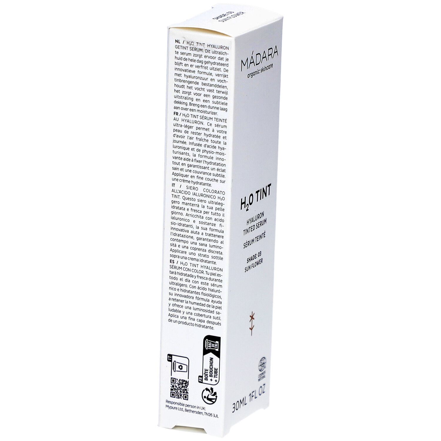 Confezione bianca con testo. Marchio: MÁDARA. Prodotto: H2O TINT Hyaluron Tinted Serum. Testo multilingue. 30ml/1FL OZ. Logo.