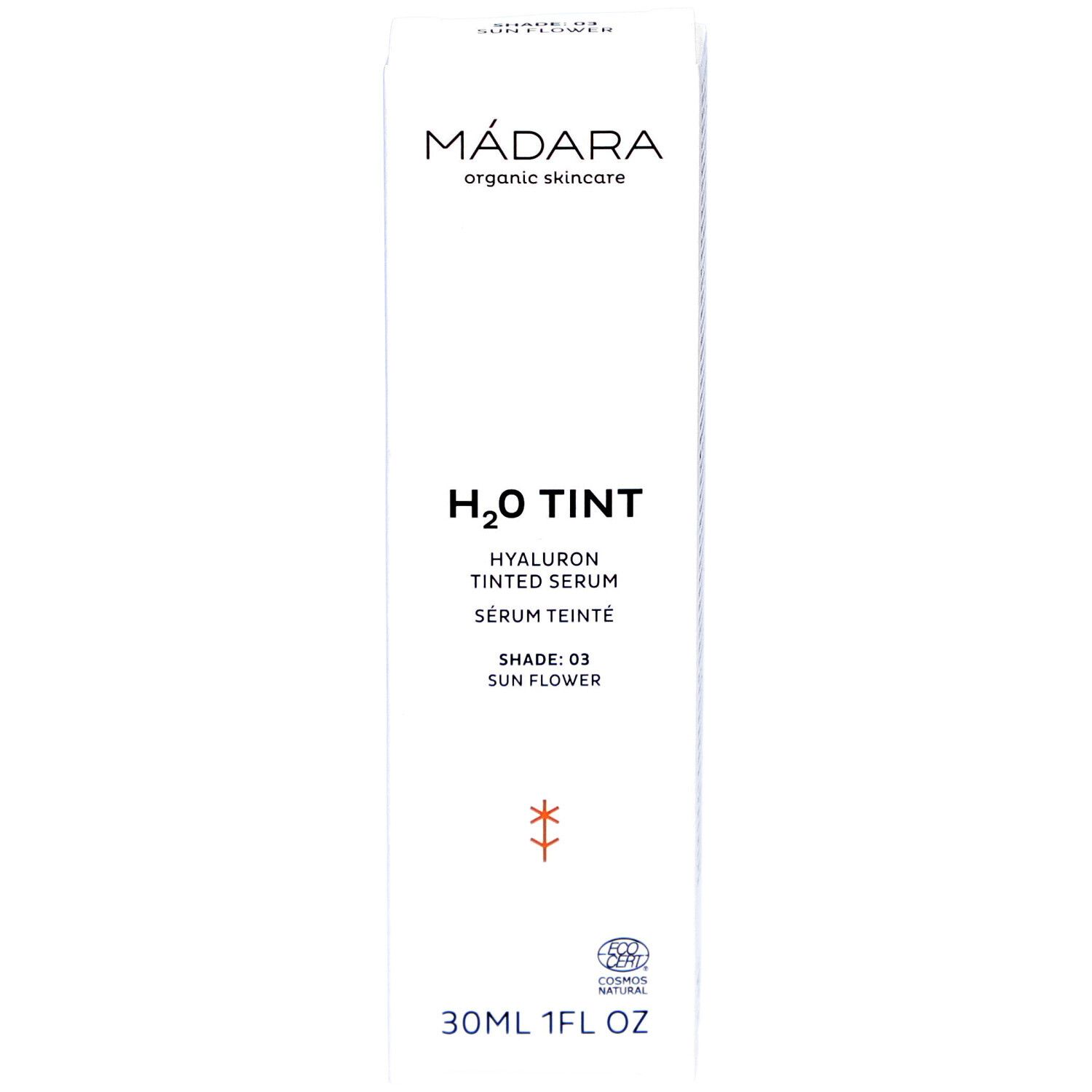 Confezione bianca con testo. Marchio: MÁDARA. Prodotto: H2O TINT Hyaluron Tinted Serum. Tonalità: 03 Sun Flower. 30ml/1FL OZ. Logo.