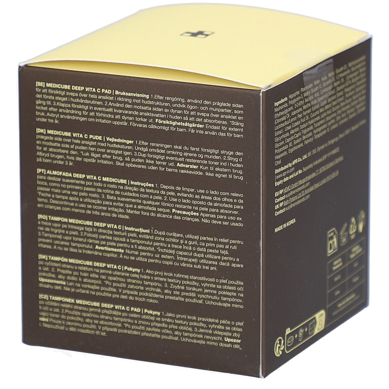 Scatola marrone con coperchio giallo. Scritte: medicube, DEEP VITA C PAD, Vitamin Water, Vitamin C Derivative, Niacinamide 2%. Istruzioni per l'uso.
