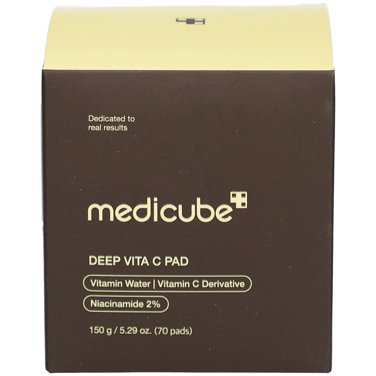 Scatola marrone con coperchio giallo. Scritte: medicube, DEEP VITA C PAD, Vitamin Water, Vitamin C Derivative, Niacinamide 2%.