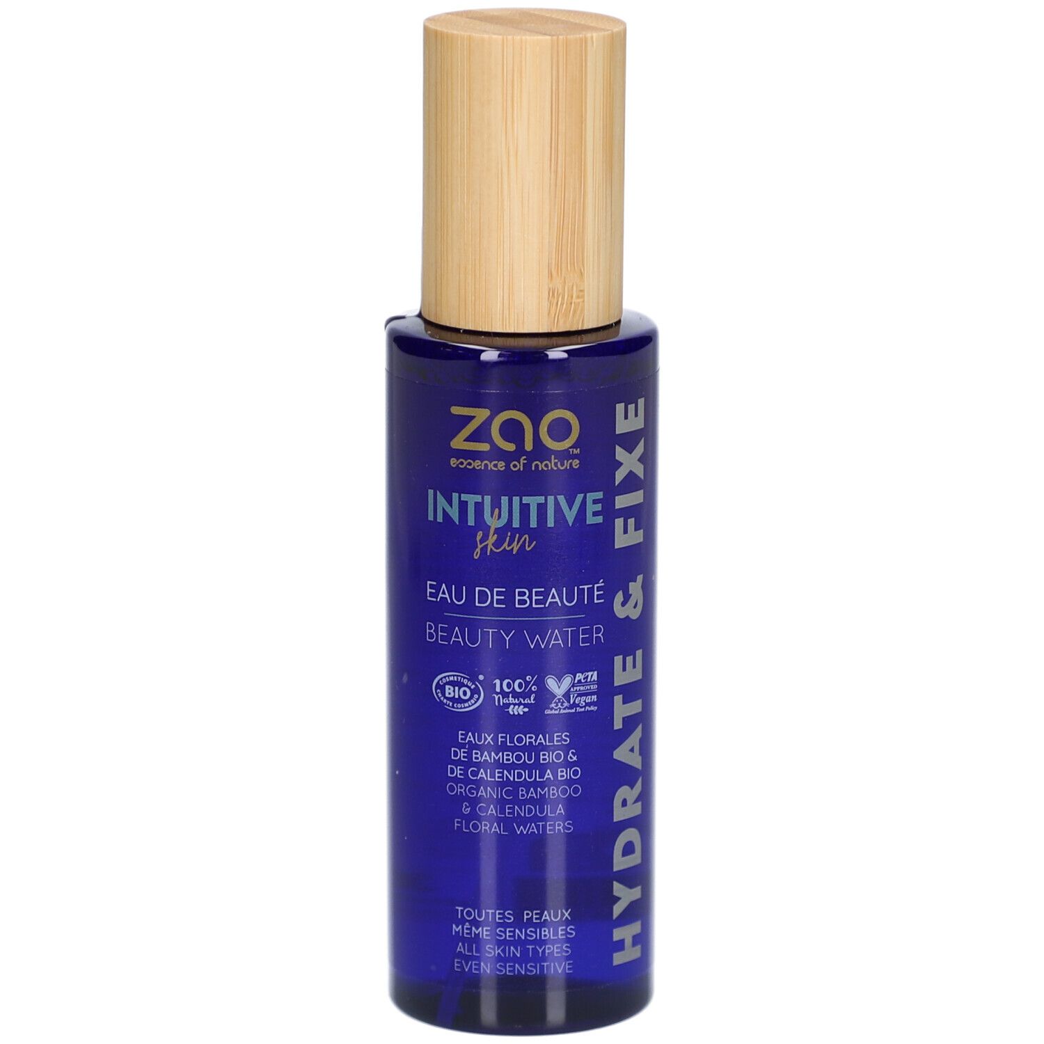 Flacone blu con tappo in legno. Scritta: ZAO, Intuitive Skin, Eau de Beauté, Beauty Water. Hydrate & Fixe.