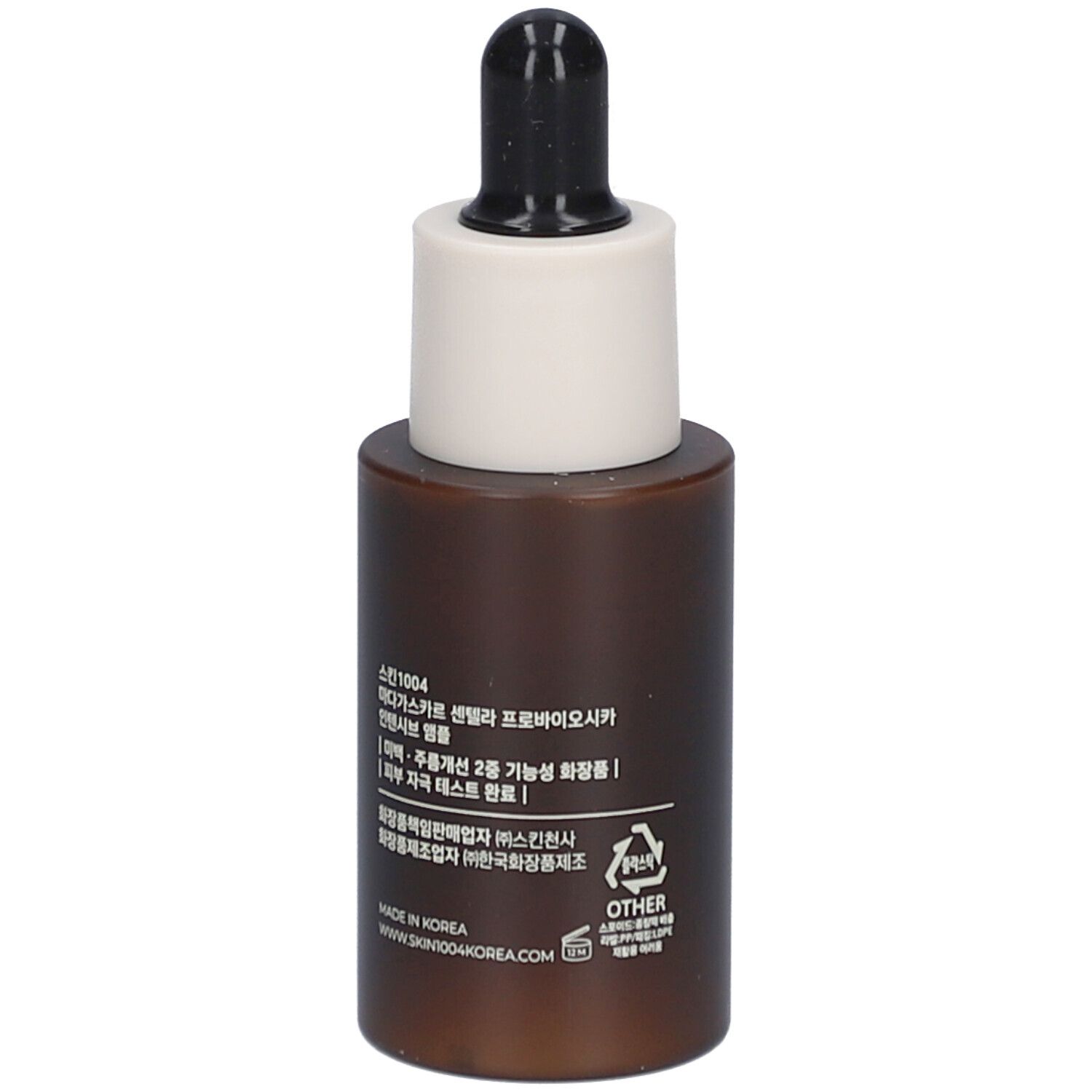 Flacone di siero marrone con tappo bianco e pipetta nera. Retro con testo. SKIN1004.