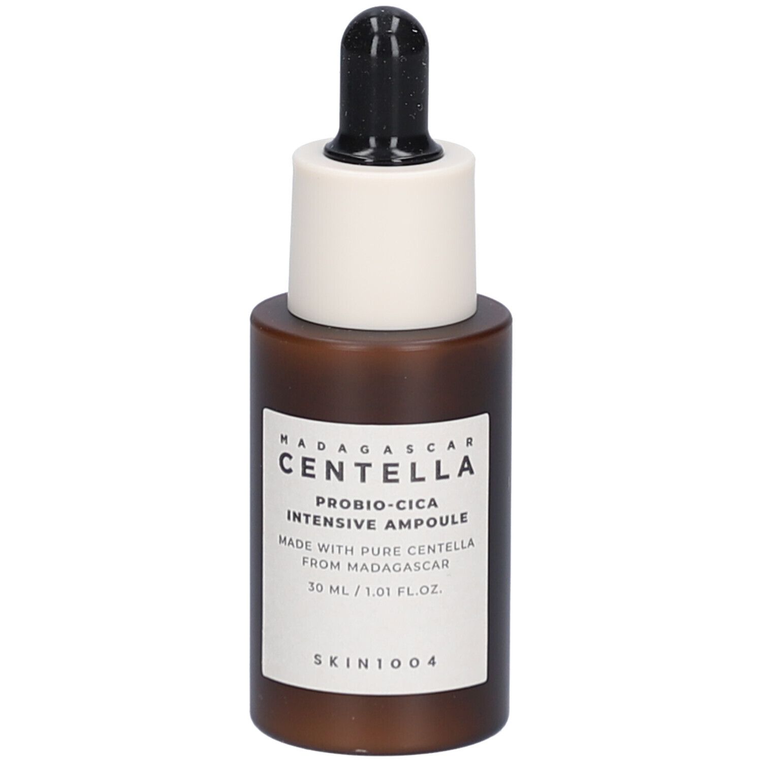 Flacone di siero marrone con tappo bianco e pipetta nera. Etichetta con testo. SKIN1004.