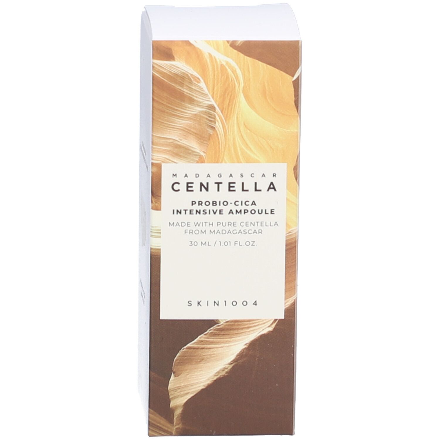 Confezione. Scatola marrone con testo e logo. SKIN1004.