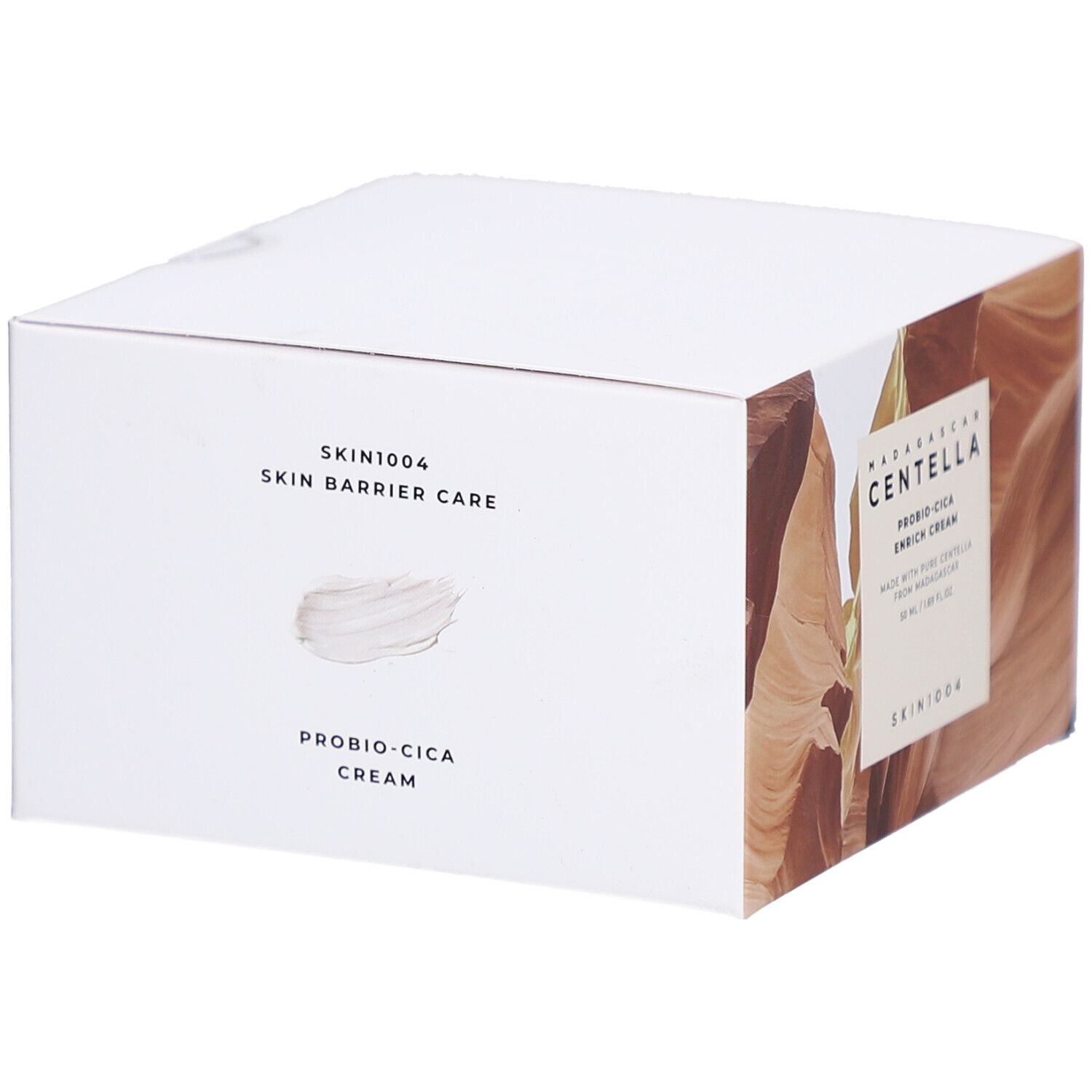Scatola bianca con informazioni sul prodotto. Testo: SKIN1004, SKIN BARRIER CARE, PROBIO-CICA CREAM.