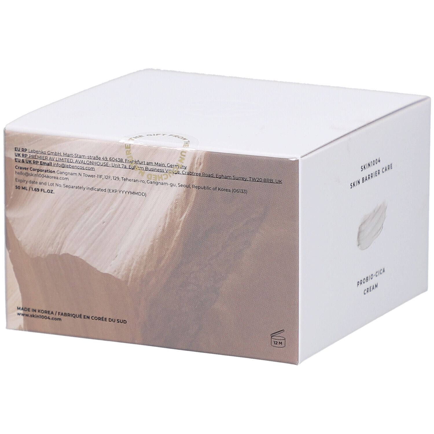 Retro della scatola bianca. Testo: SKIN1004, informazioni sul prodotto, ingredienti, origine.