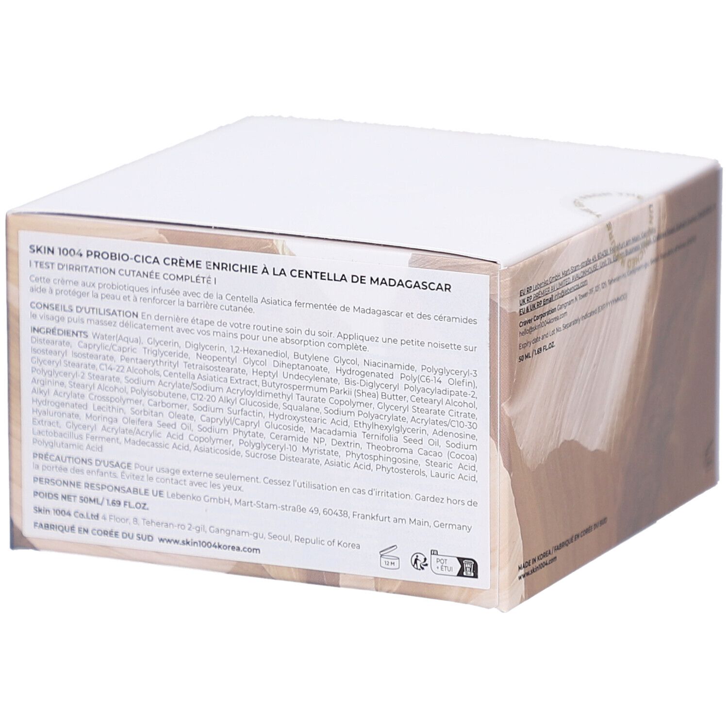 Retro della scatola bianca. Testo: SKIN1004, informazioni sul prodotto, ingredienti, origine.