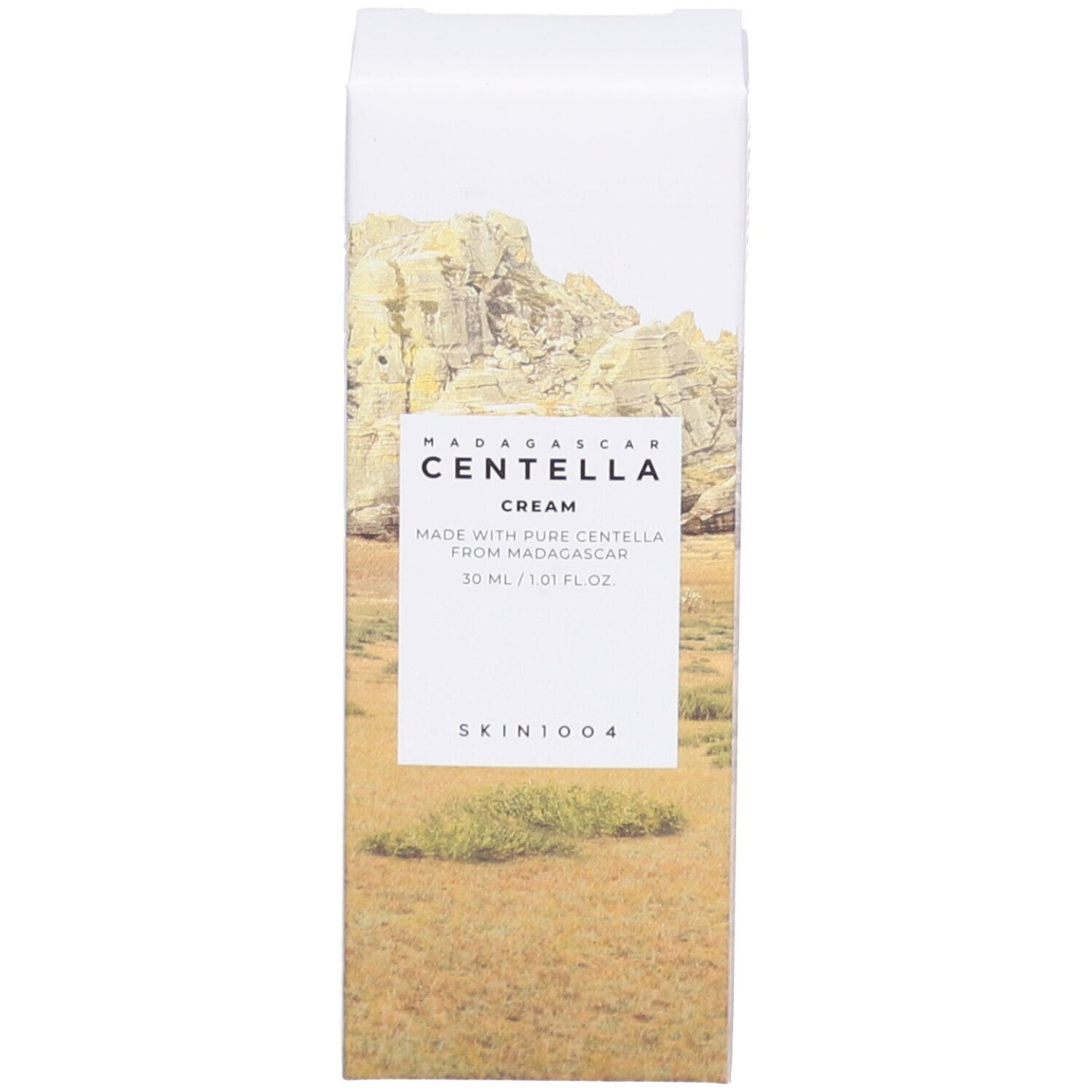 Confezione bianca con paesaggio. Scritta: MADAGASCAR CENTELLA CREAM, 30 ml, SKIN1004.
