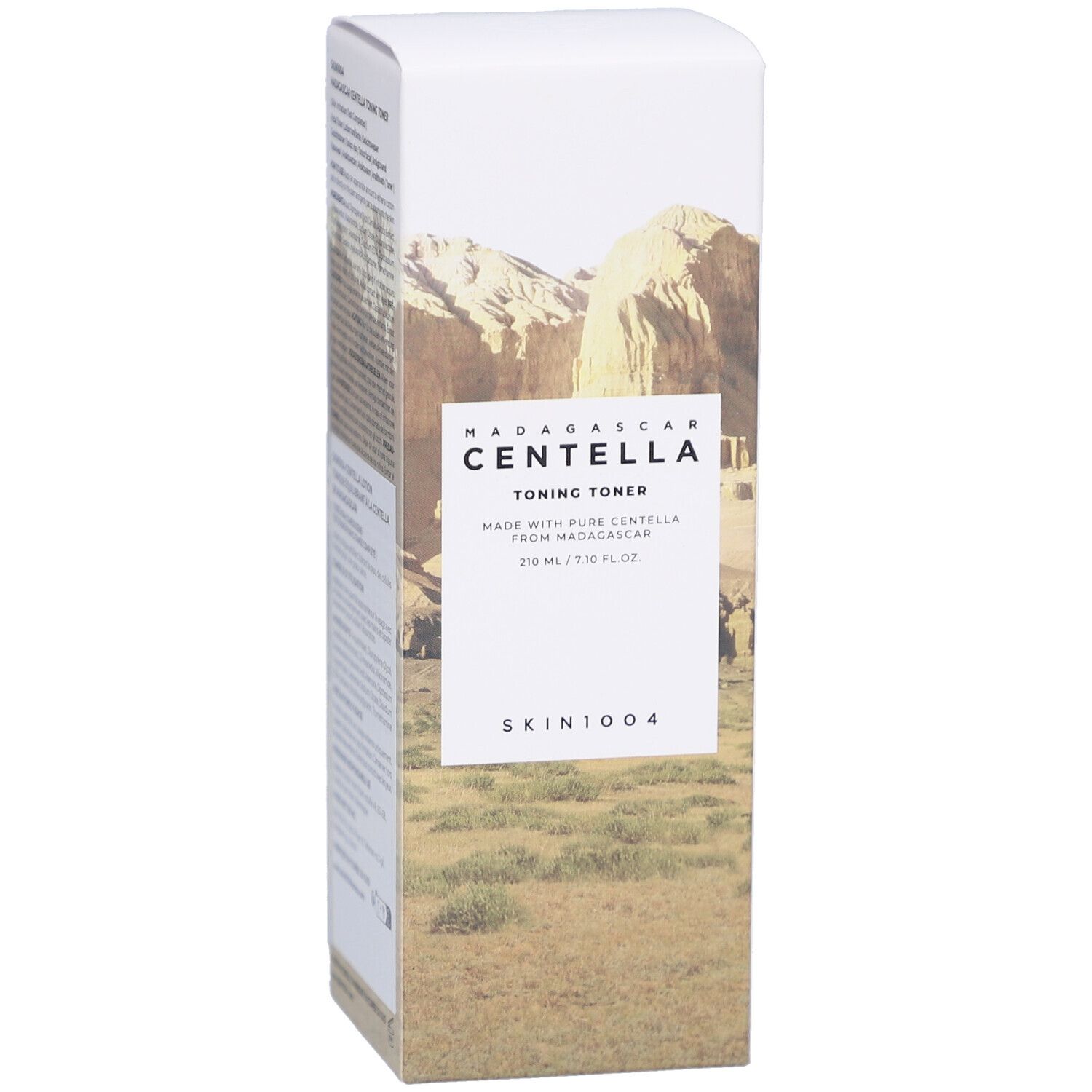 Confezione bianca con stampa paesaggistica. Testo: MADAGASCAR CENTELLA Toning Toner, SKIN1004. Scritta: 210 ml / 7.10 fl.oz.