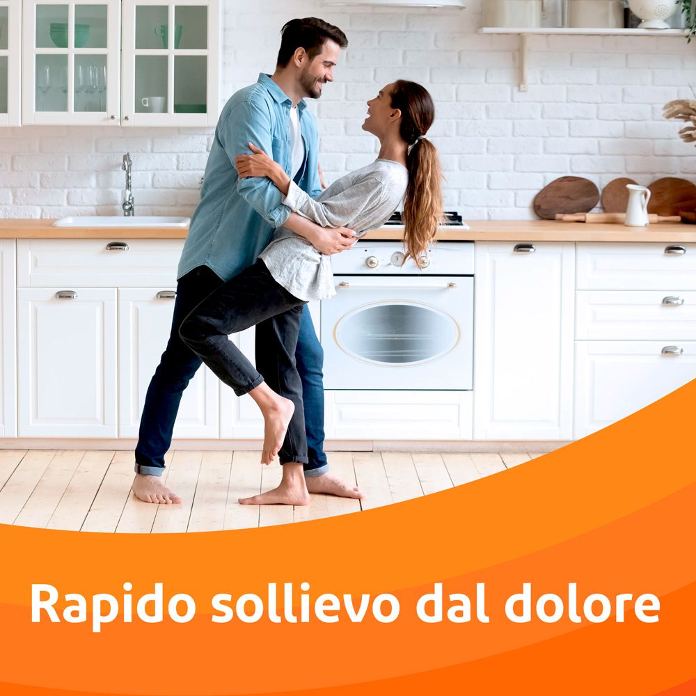 Coppia che balla in cucina. Testo: Rapido sollievo dal dolore.