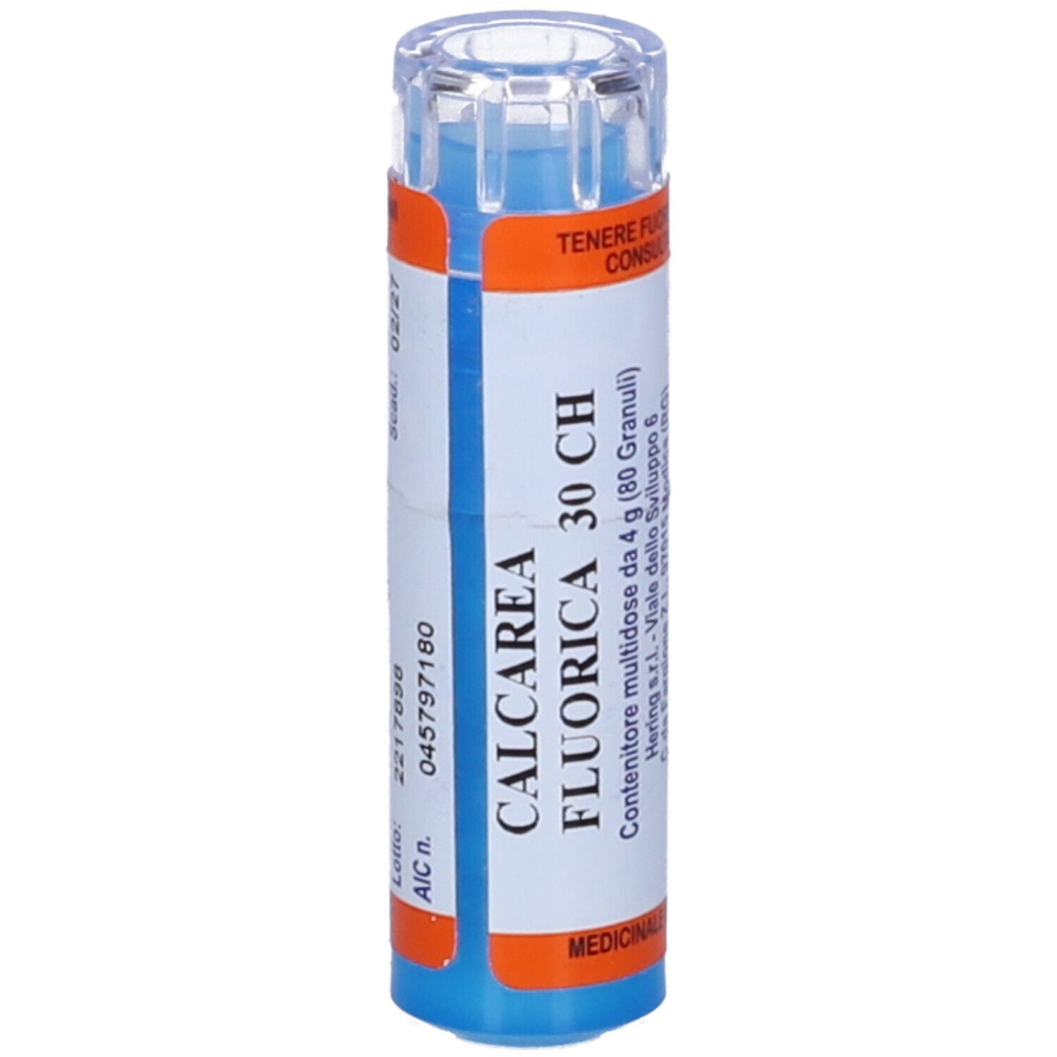 Flacone cilindrico blu con etichetta bianca. Scritta: CALCAREA FLUORICA 30 CH. Dettagli arancioni. Coperchio trasparente.
