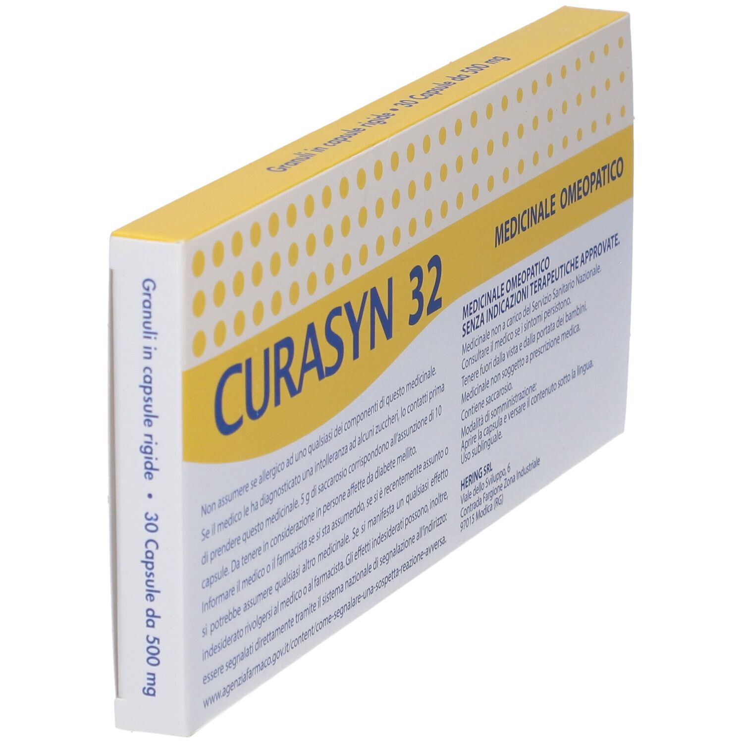 Scatola di Curasyn 32 angolata. Gialla e bianca, con nome del prodotto e informazioni mediche. "30 Capsule da 500 mg".