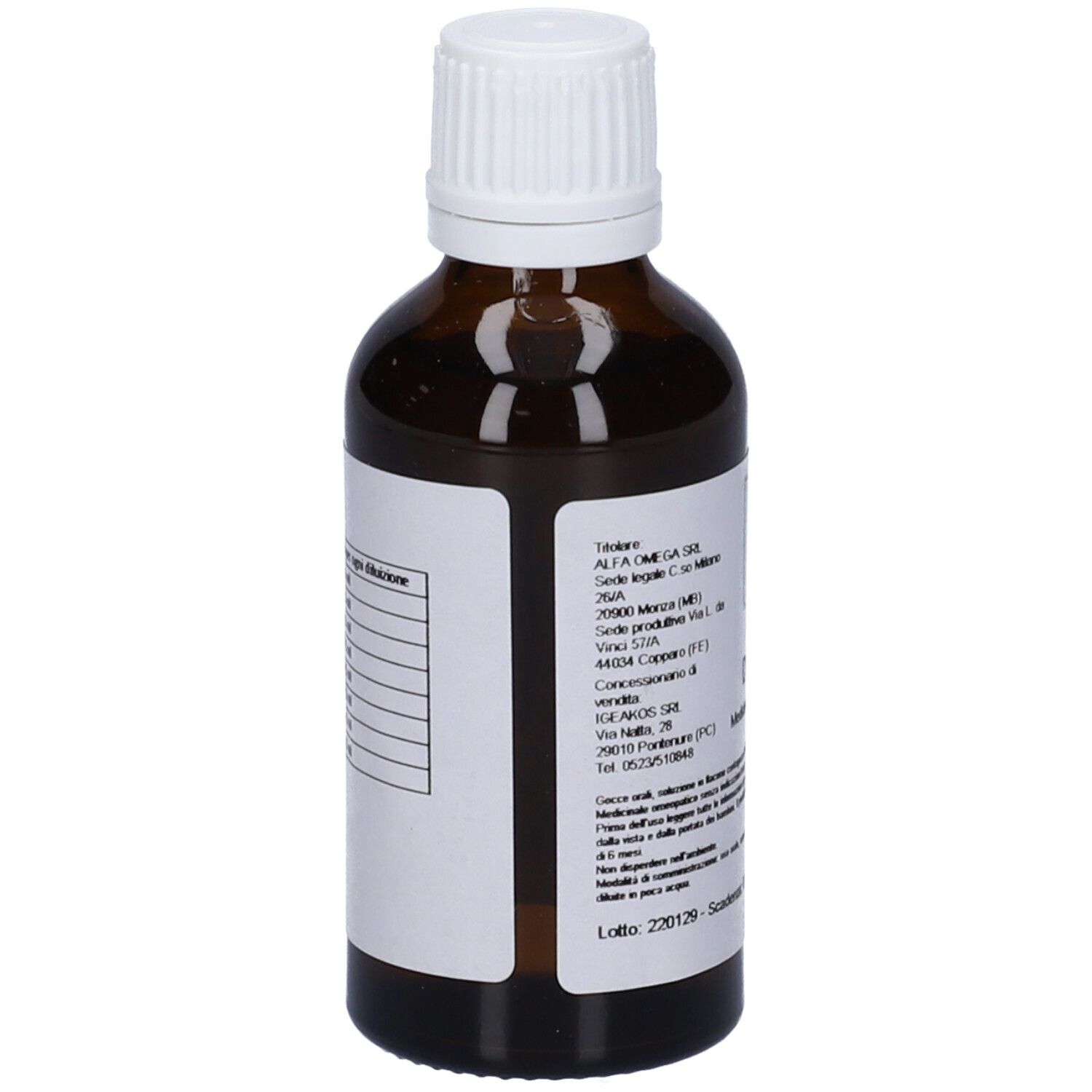 Flacone di vetro marrone con tappo bianco. Retro con etichetta e testo. Informazioni produttore e numero di lotto.