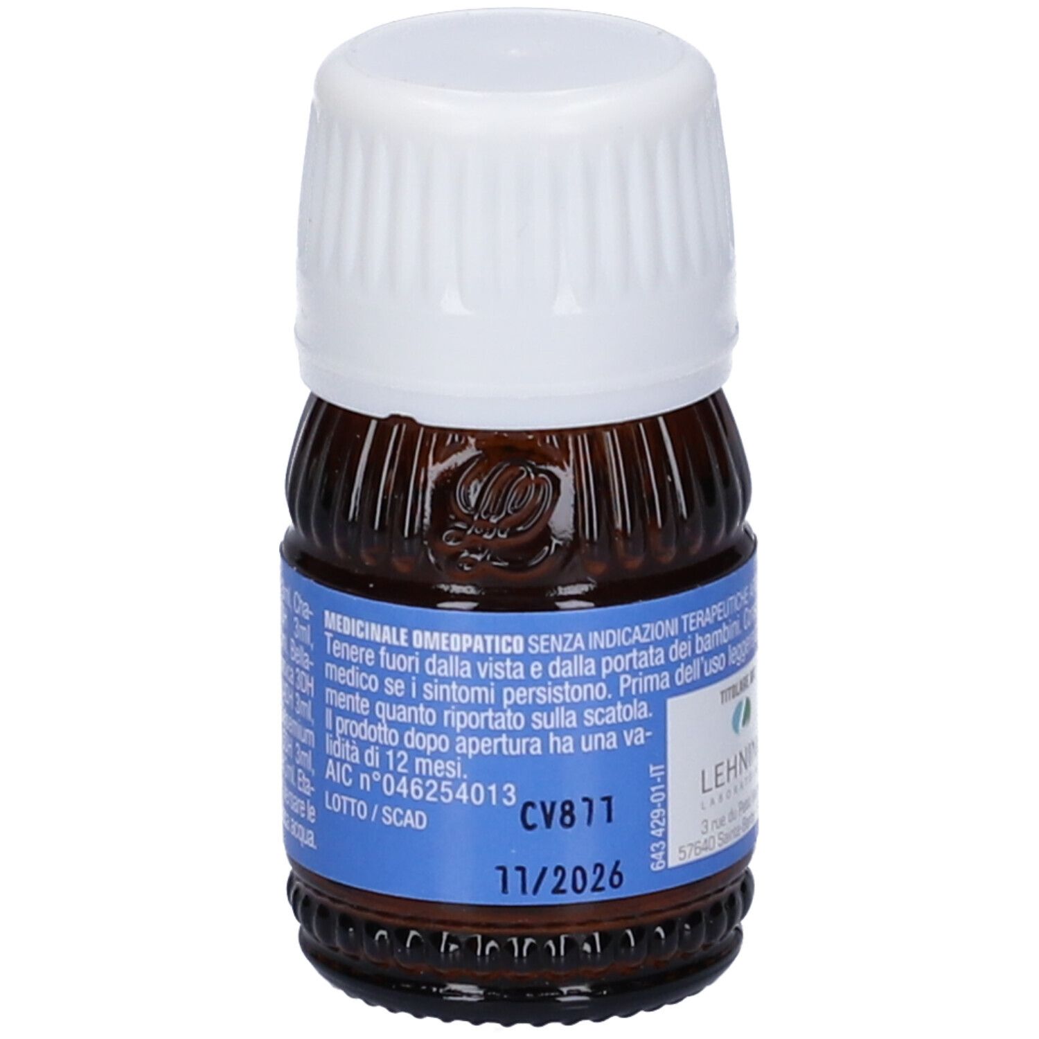 Flacone di vetro marrone con tappo bianco. Etichetta con informazioni e testo sul prodotto. Flacone contagocce. Scadenza 11/2026.