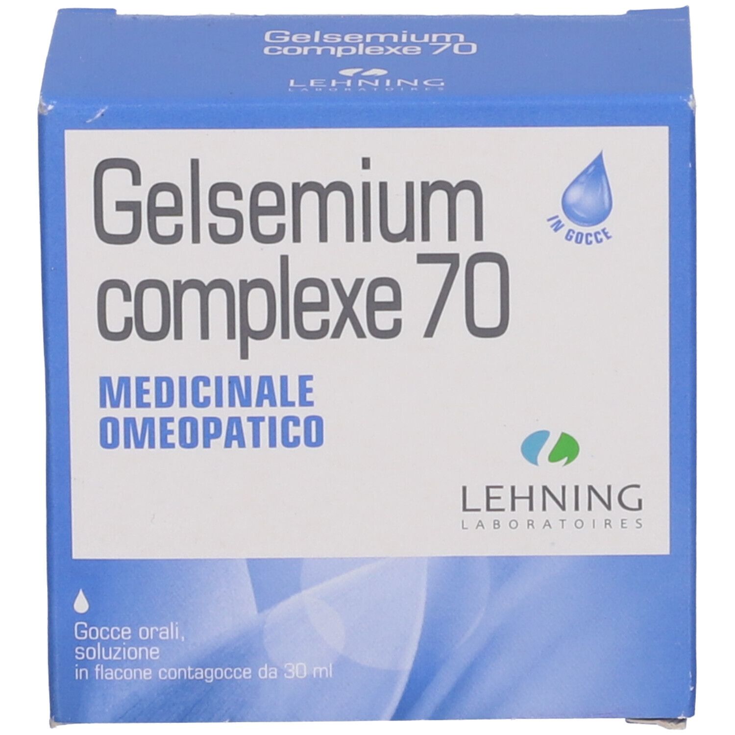 Scatola blu con nome e logo del prodotto. Simbolo della goccia. Testo: Medicinale omeopatico.