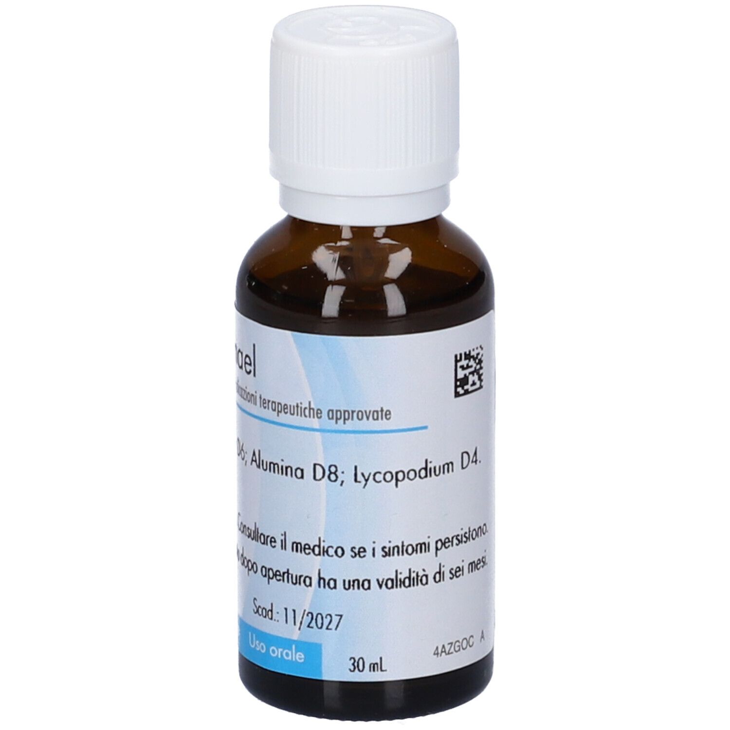 Flacone di vetro marrone con tappo bianco. Etichetta con nome e ingredienti. Testo in italiano. Data di scadenza.