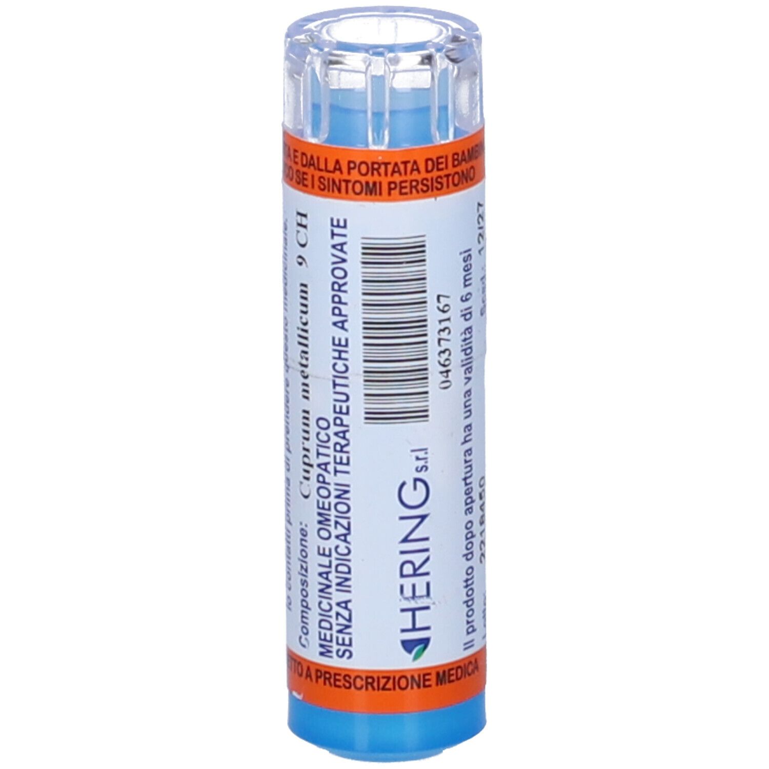 Contenitore blu cilindrico. Scritta: Hering. Testo: Medicinale omeopatico. Etichette arancioni e blu.